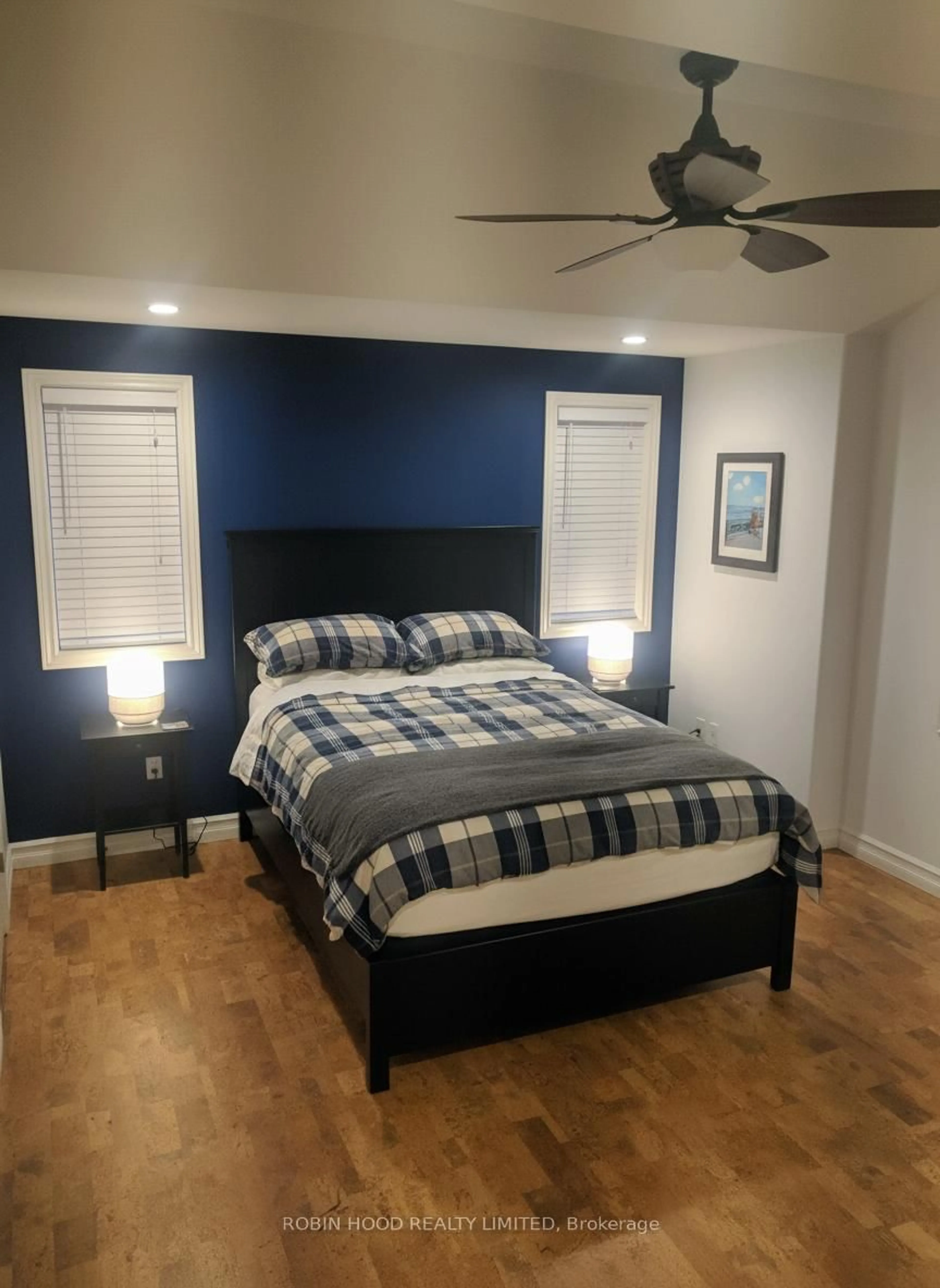 Bedroom with bed, wood/laminate floor for 2701 Bateman Tr, London South Ontario N6L 0A9