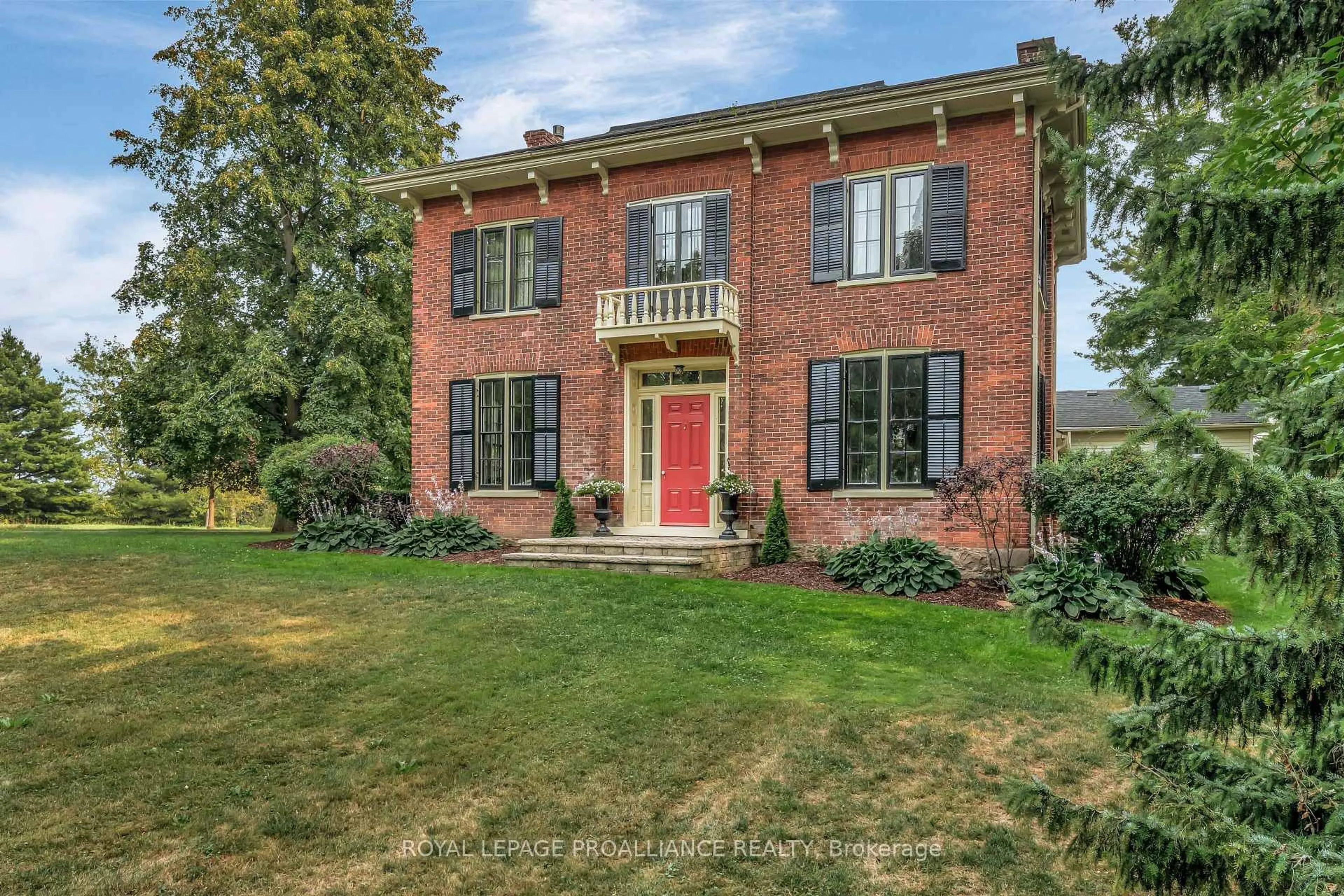 Home with brick exterior material, street for 14065 Loyalist Pkwy, Prince Edward County Ontario K0K 2T0