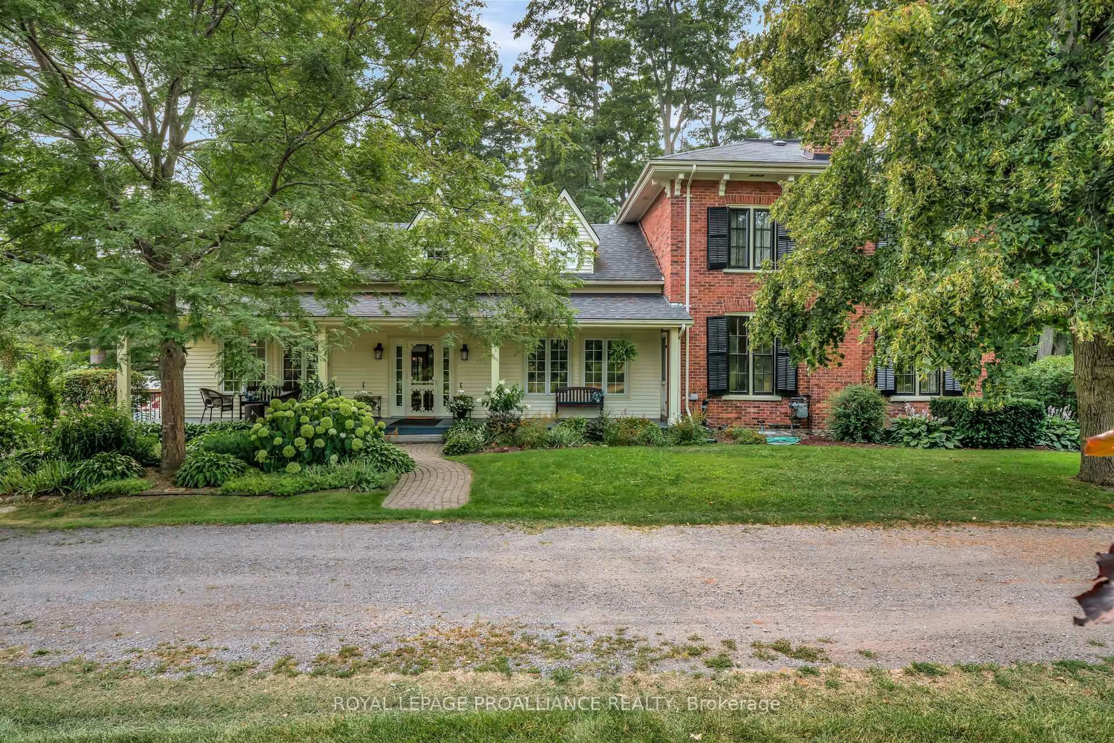 Home with brick exterior material, street for 14065 Loyalist Pkwy, Prince Edward County Ontario K0K 2T0