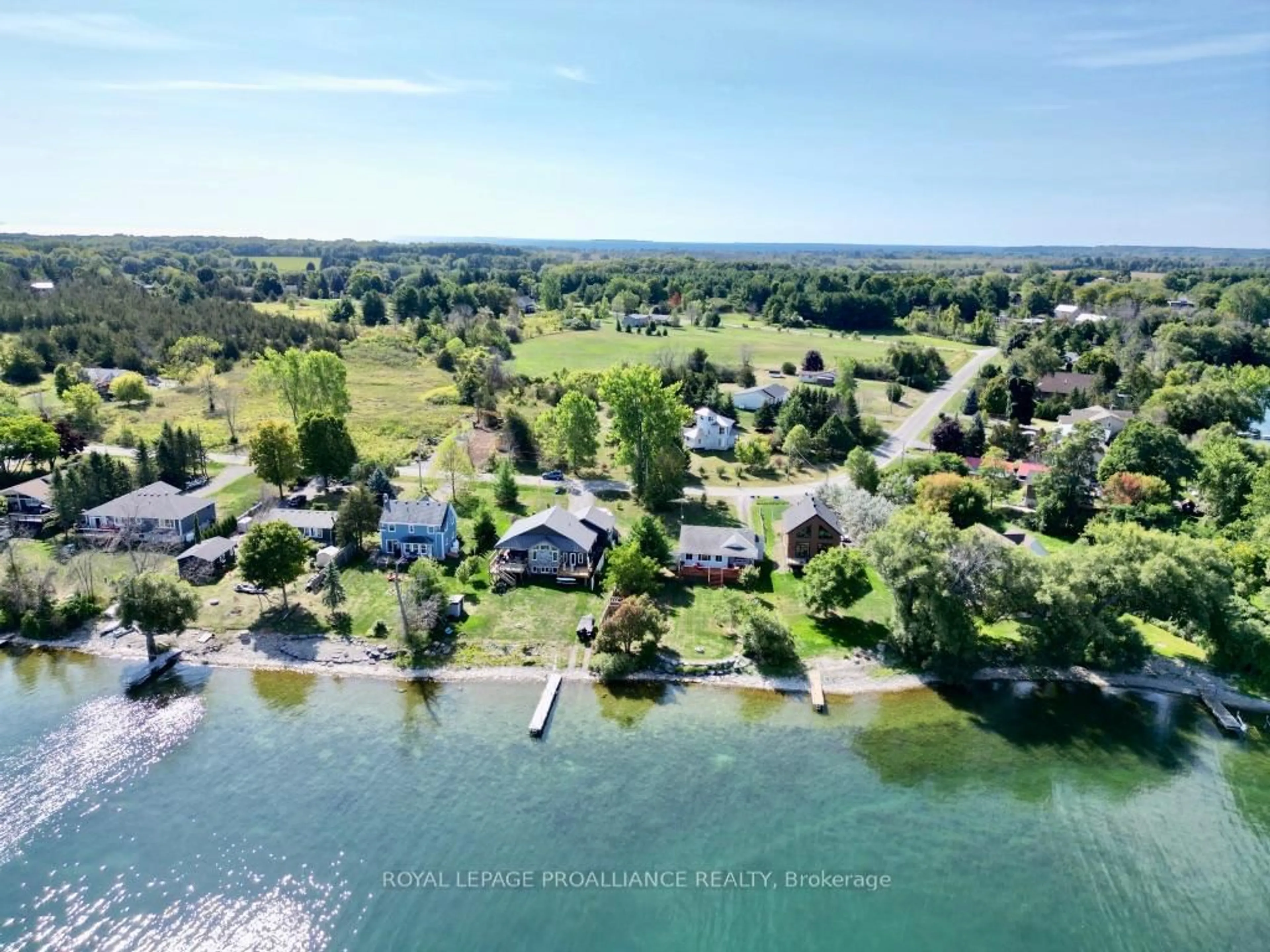 A pic from outside/outdoor area/front of a property/back of a property/a pic from drone, water/lake/river/ocean view for 211 Prinyers Cove Cres, Prince Edward County Ontario K0K 2T0
