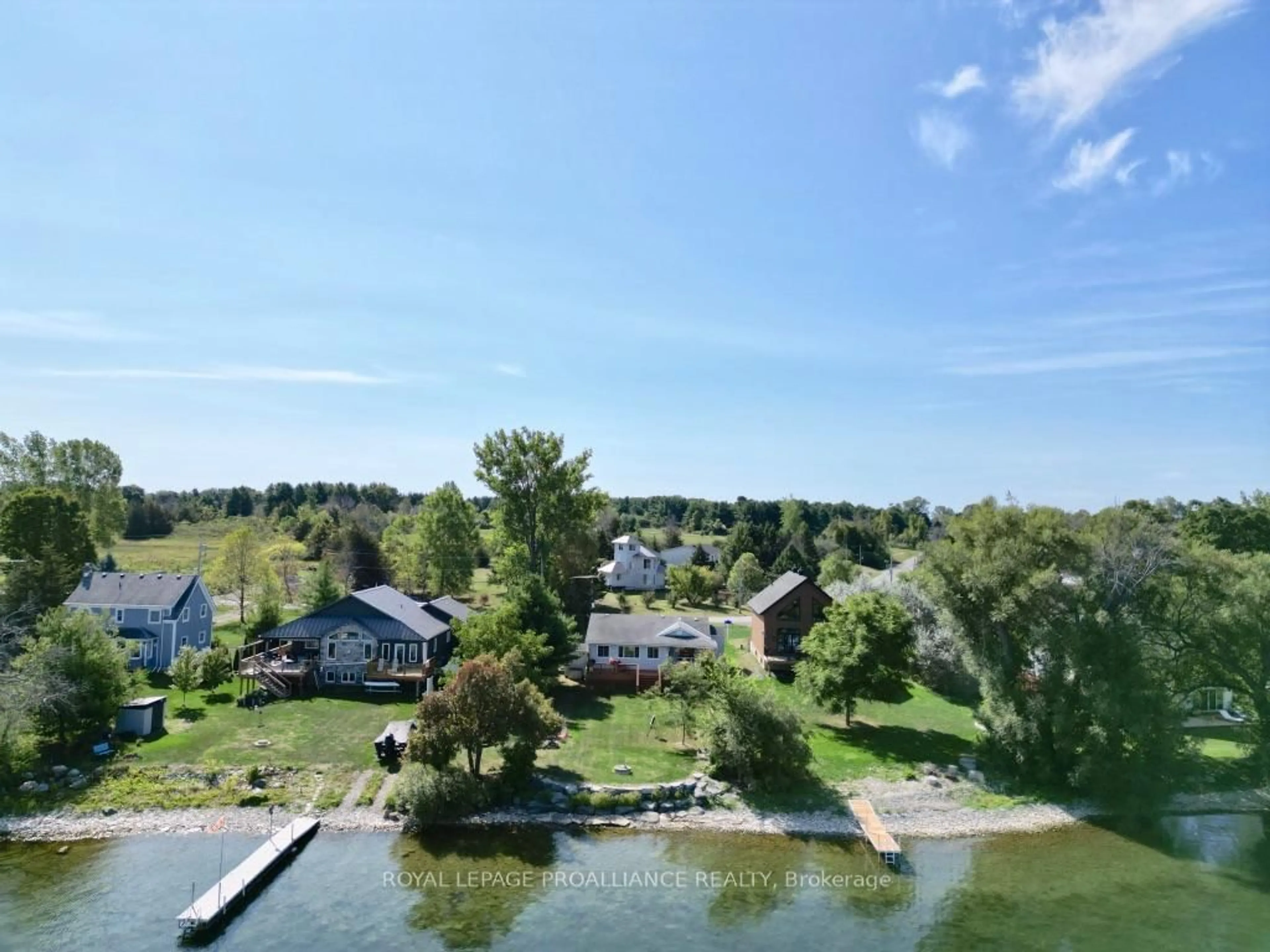 A pic from outside/outdoor area/front of a property/back of a property/a pic from drone, water/lake/river/ocean view for 211 Prinyers Cove Cres, Prince Edward County Ontario K0K 2T0
