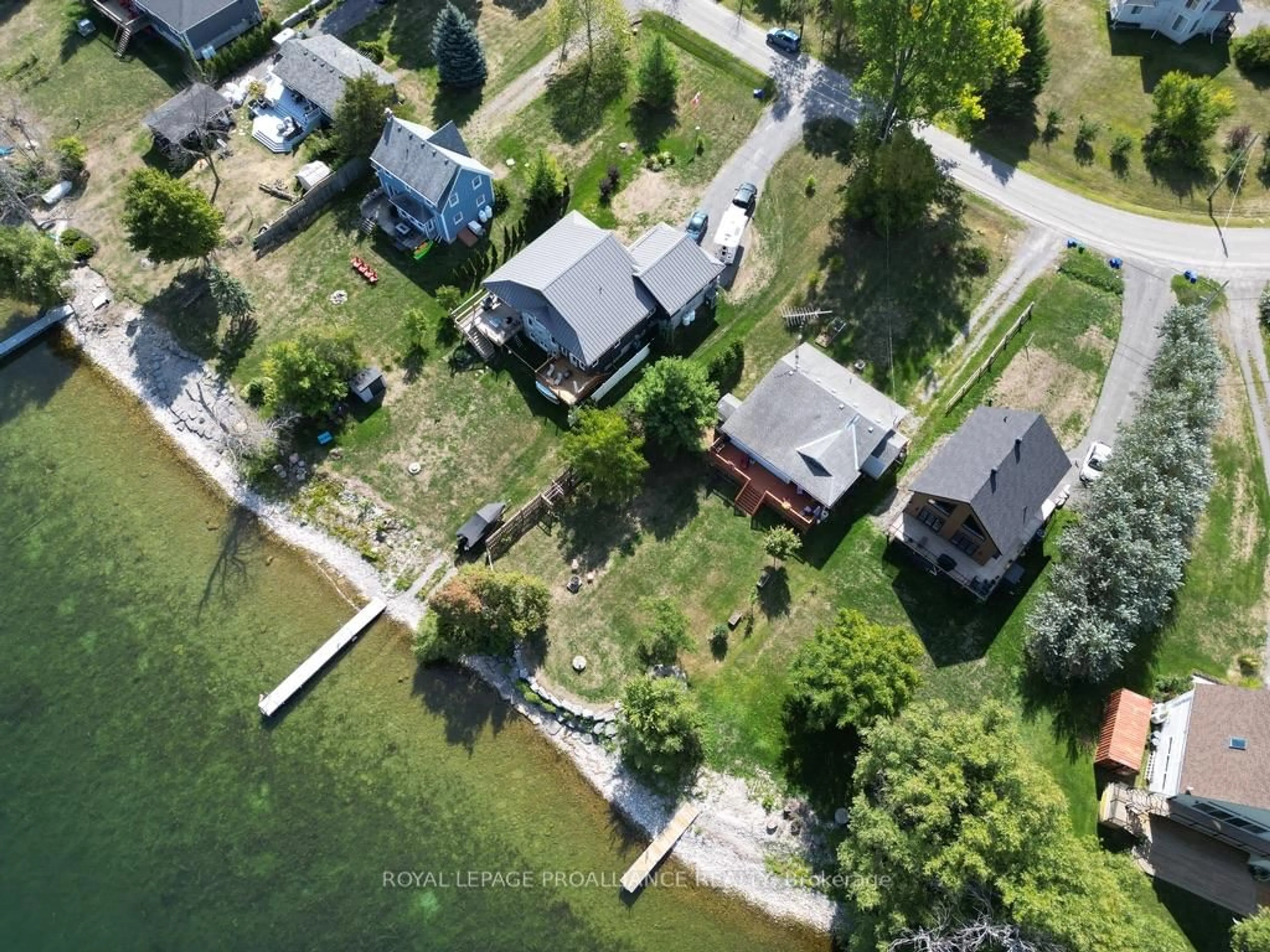 A pic from outside/outdoor area/front of a property/back of a property/a pic from drone, water/lake/river/ocean view for 211 Prinyers Cove Cres, Prince Edward County Ontario K0K 2T0