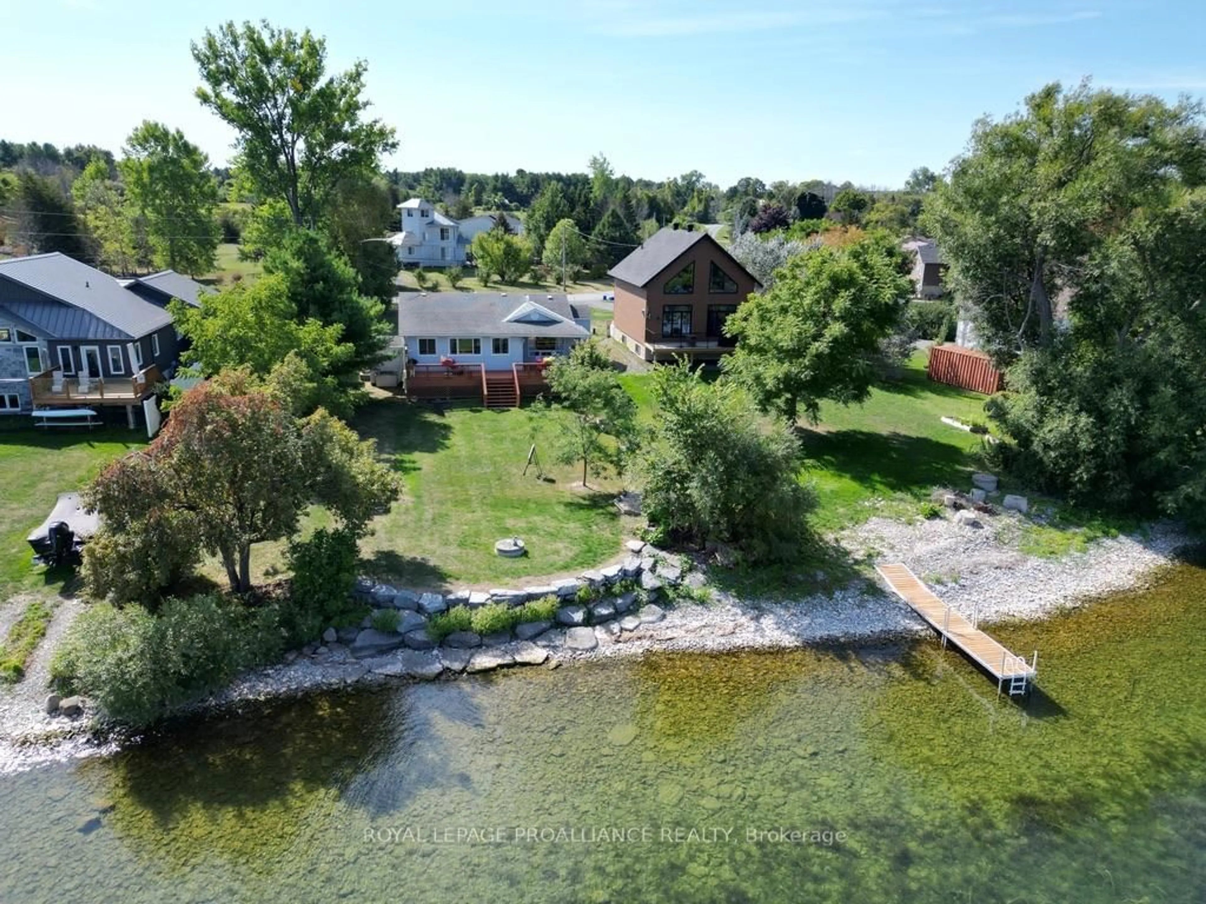 A pic from outside/outdoor area/front of a property/back of a property/a pic from drone, water/lake/river/ocean view for 211 Prinyers Cove Cres, Prince Edward County Ontario K0K 2T0