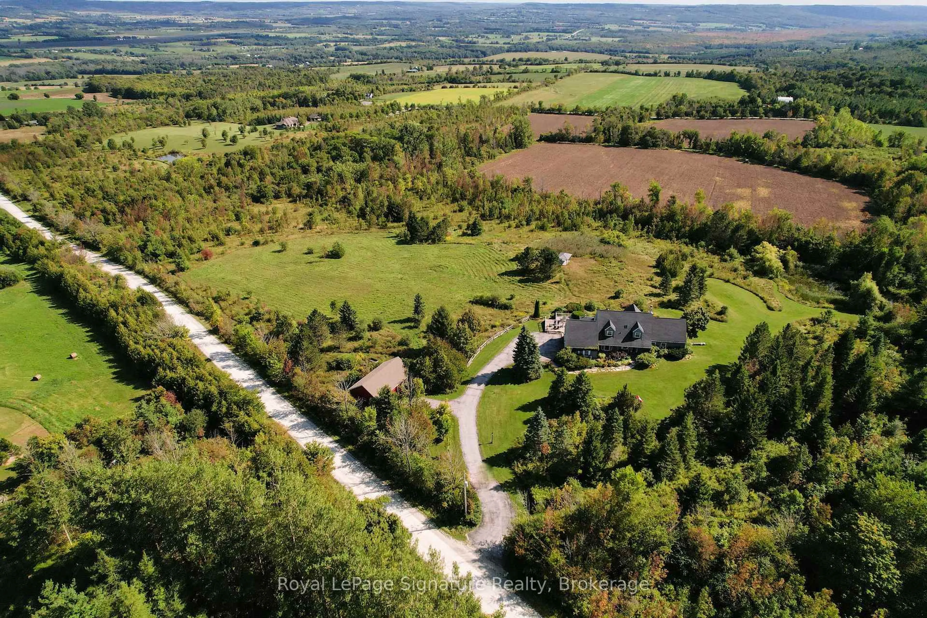 A pic from outside/outdoor area/front of a property/back of a property/a pic from drone, unknown for 47058 Old Mail Rd, Grey Highlands Ontario N4L 1W7