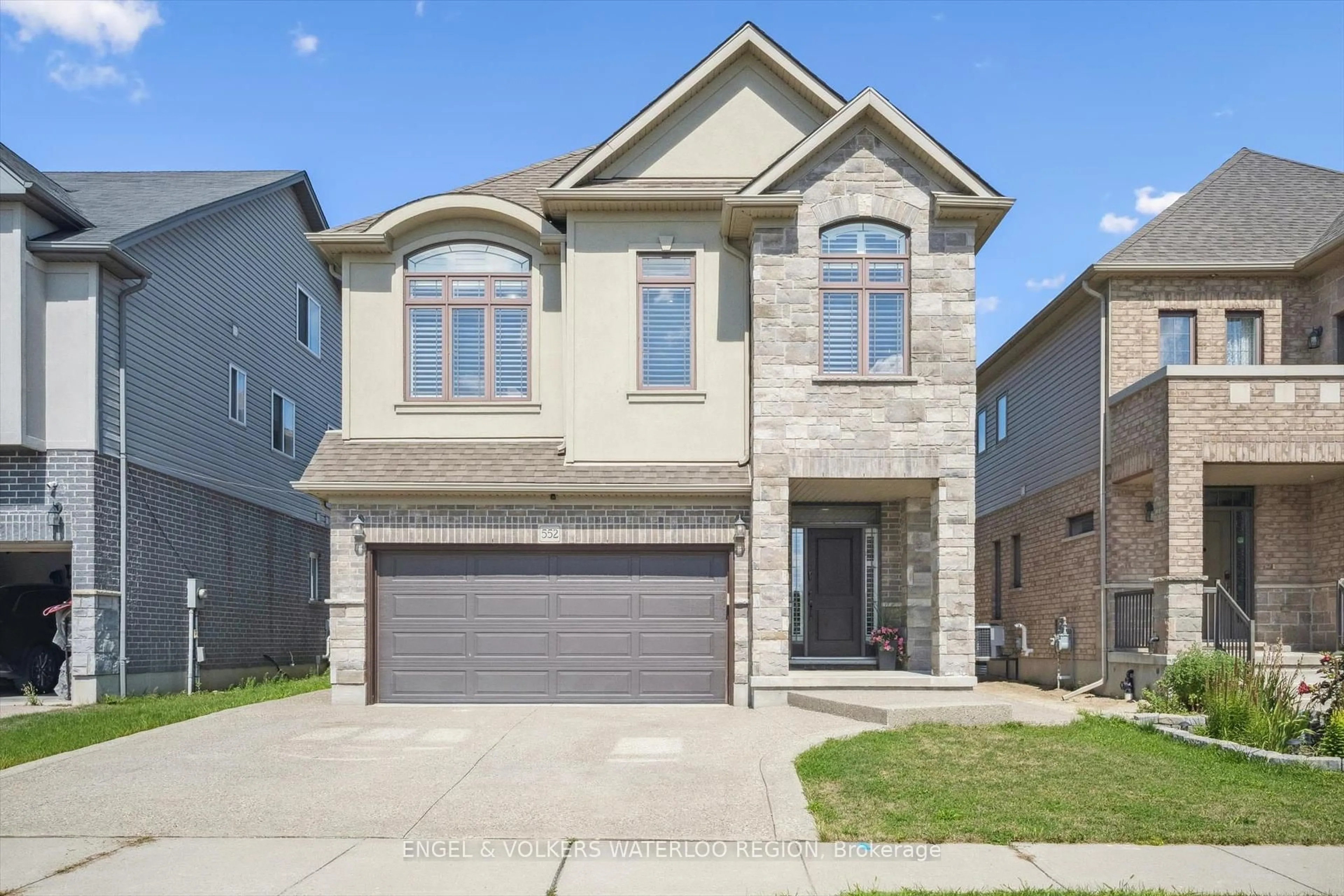 Home with brick exterior material, street for 552 Wasaga Cres, Waterloo Ontario N2V 2Y7