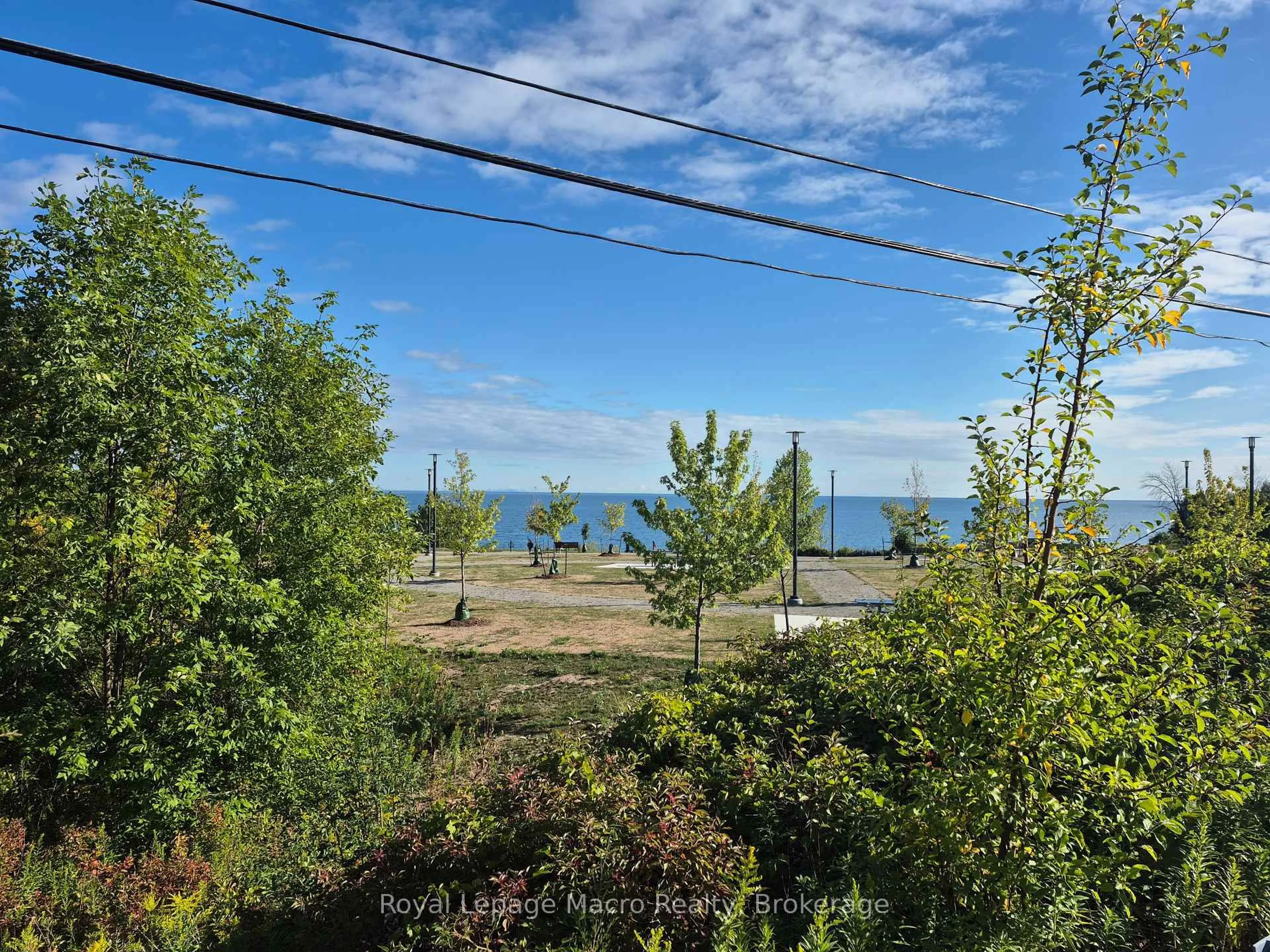 A pic from outside/outdoor area/front of a property/back of a property/a pic from drone, water/lake/river/ocean view for 16 Concord Pl #308, Grimsby Ontario L3M 4E8