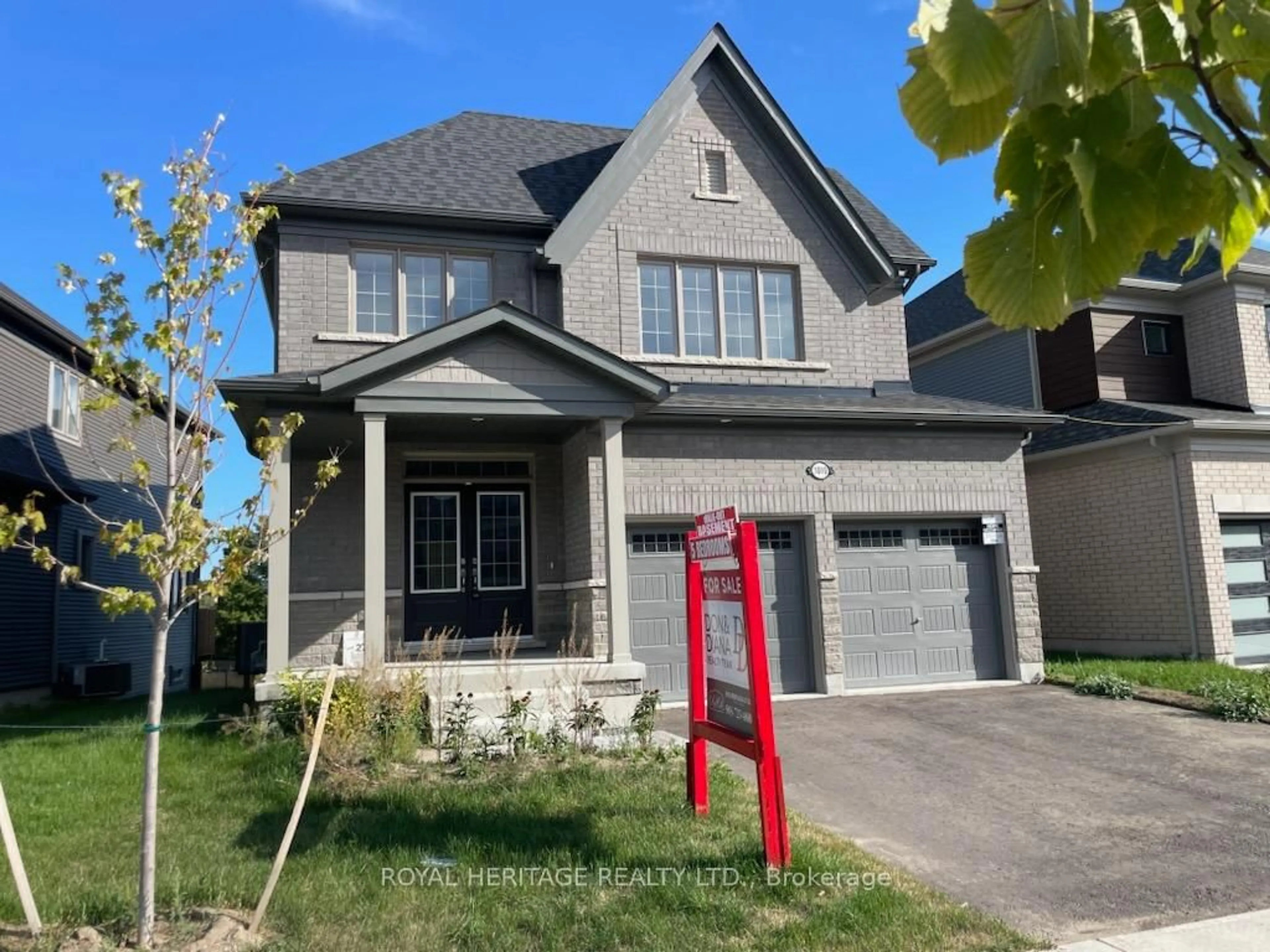 Home with brick exterior material, street for 1010 Trailsview Ave, Cobourg Ontario K9A 4J6