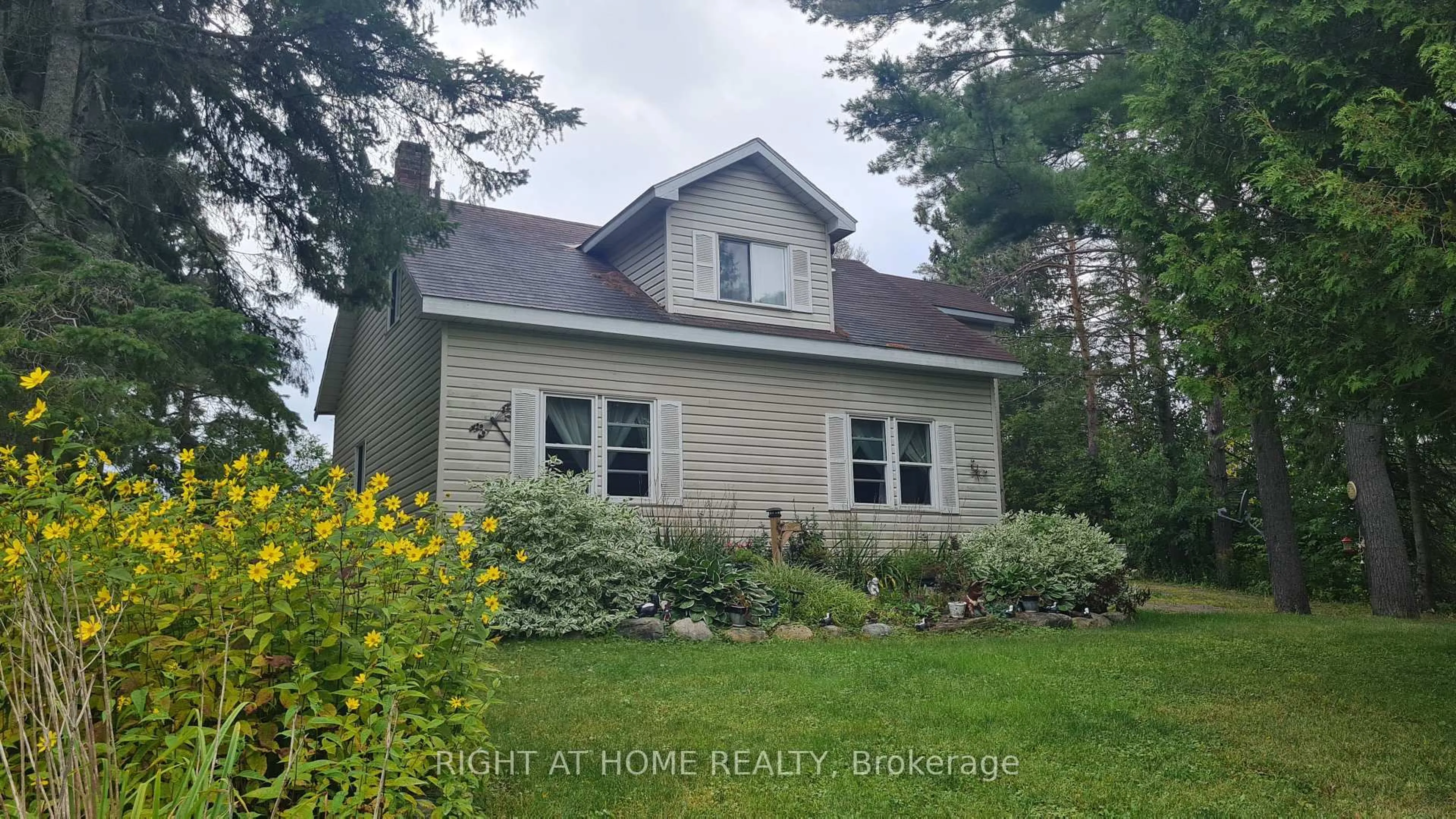 A pic from outside/outdoor area/front of a property/back of a property/a pic from drone, street for 2324 60 Highway, Lake of Bays Ontario P1H 2J6