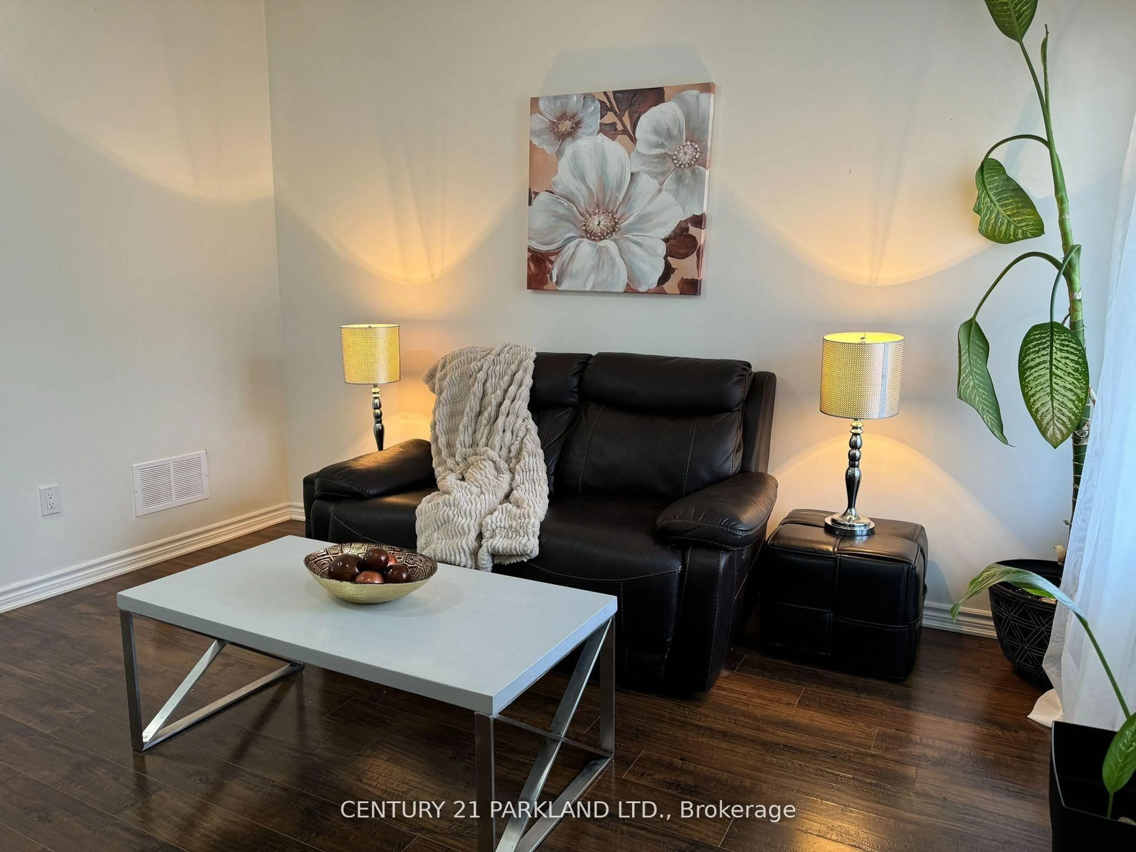 Living room with furniture, wood/laminate floor for 128 Berkshire Dr, Wellington North Ontario N0G 1A0