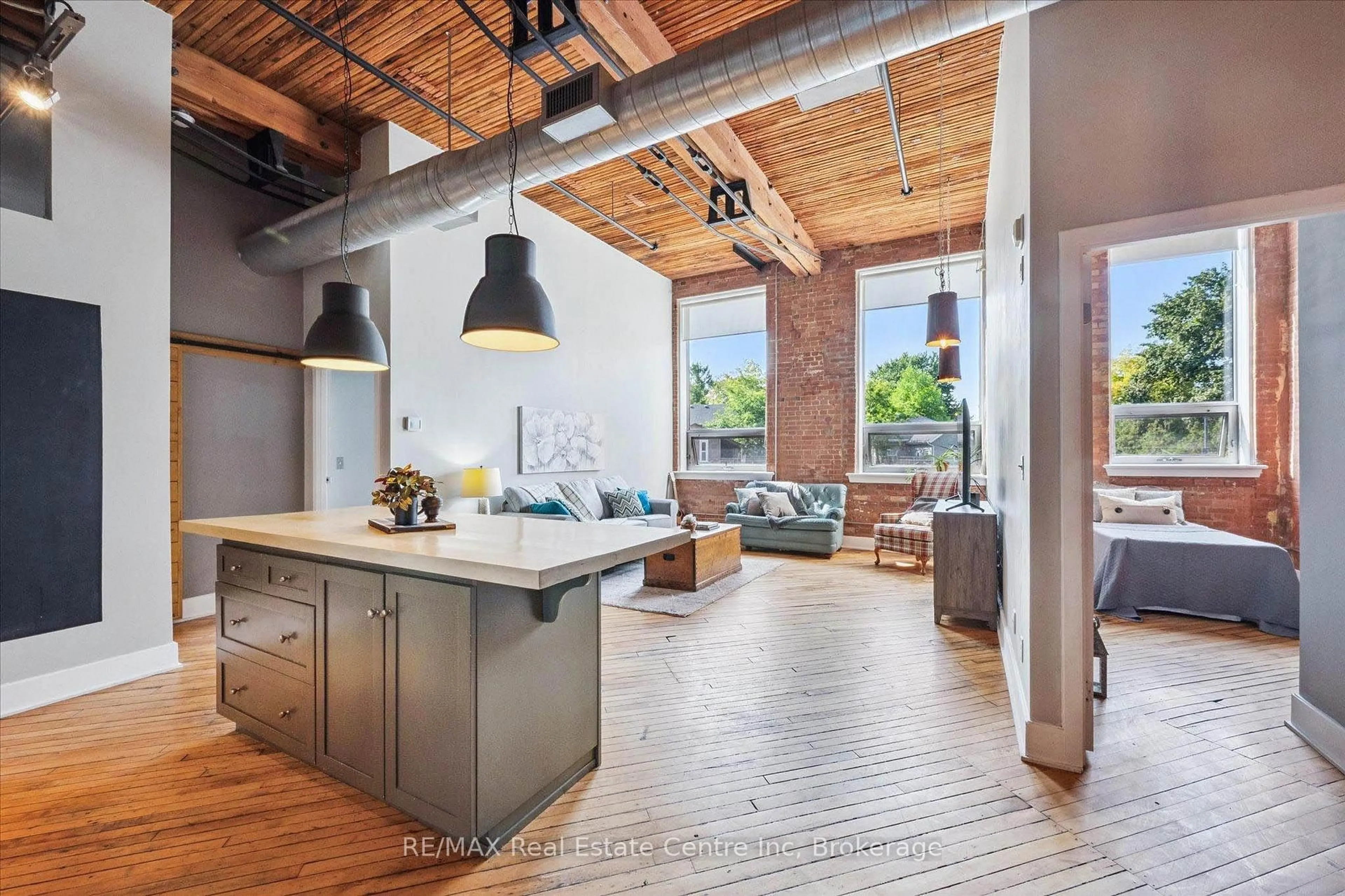 Open concept kitchen, cement floor for 26 ONTARIO St #122, Guelph Ontario N1E 7K1