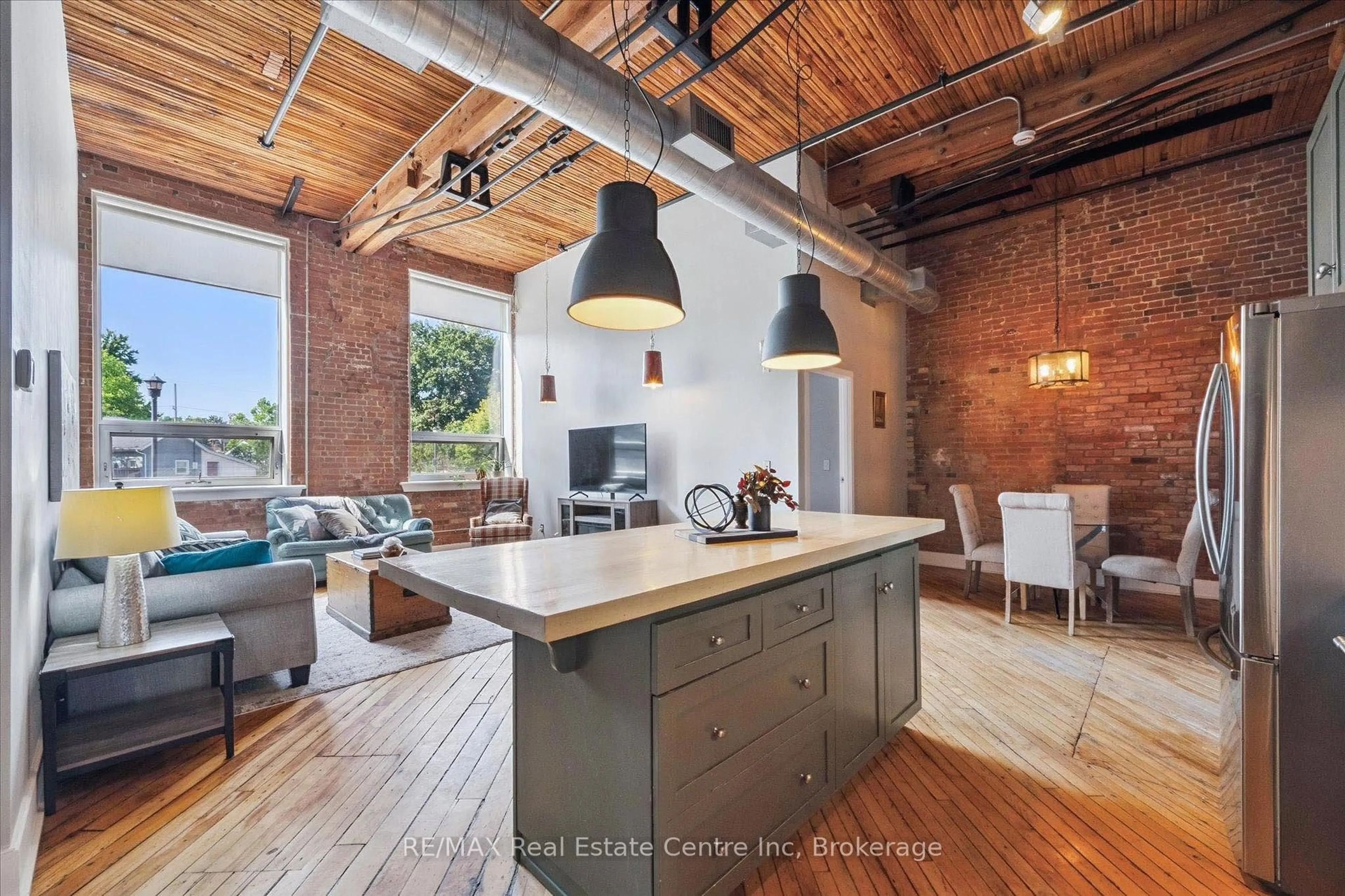 Open concept kitchen, cement floor for 26 ONTARIO St #122, Guelph Ontario N1E 7K1
