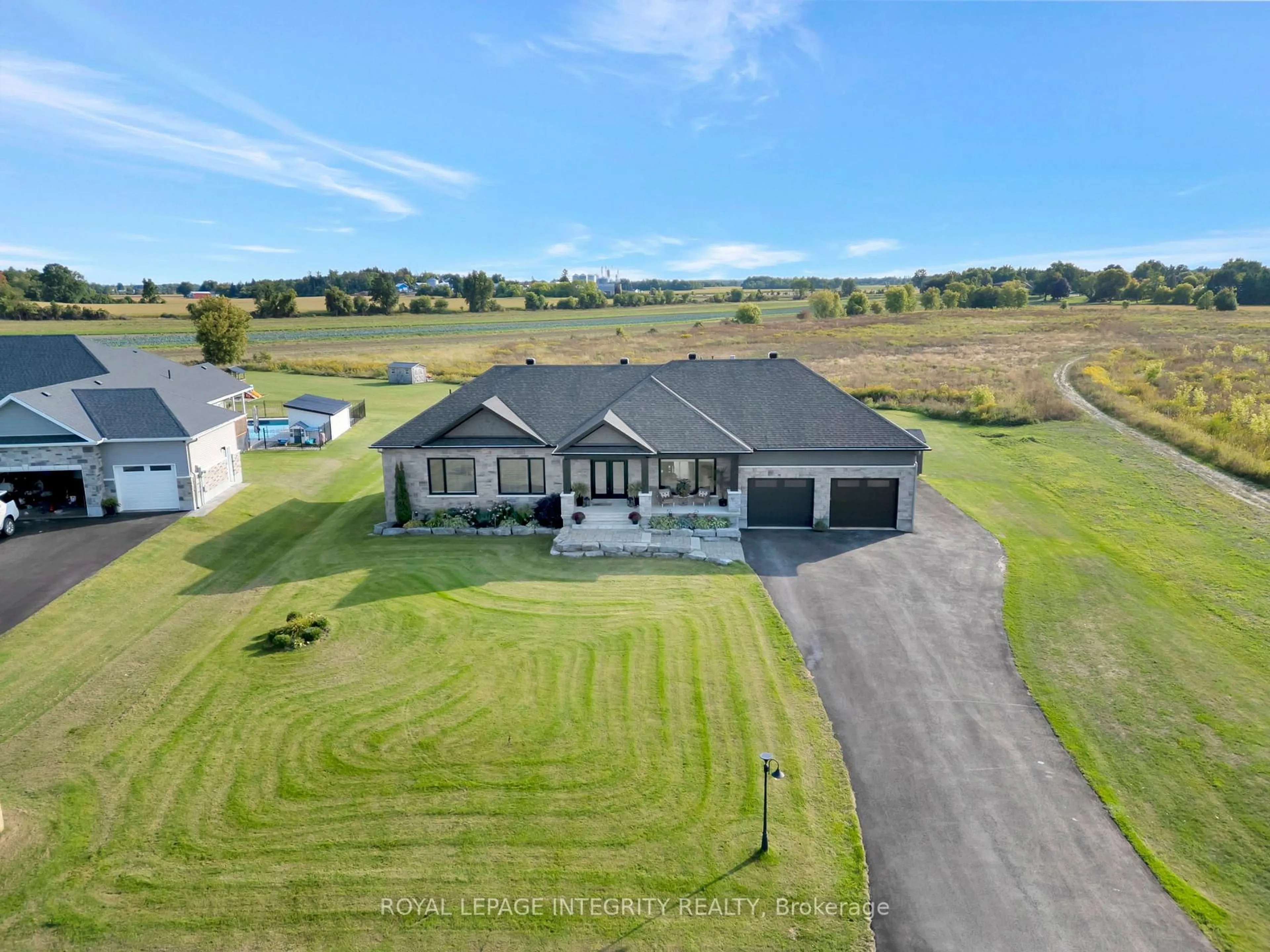 A pic from outside/outdoor area/front of a property/back of a property/a pic from drone, water/lake/river/ocean view for 2210 Maple Forest Dr, North Gower Ontario K0A 2T0