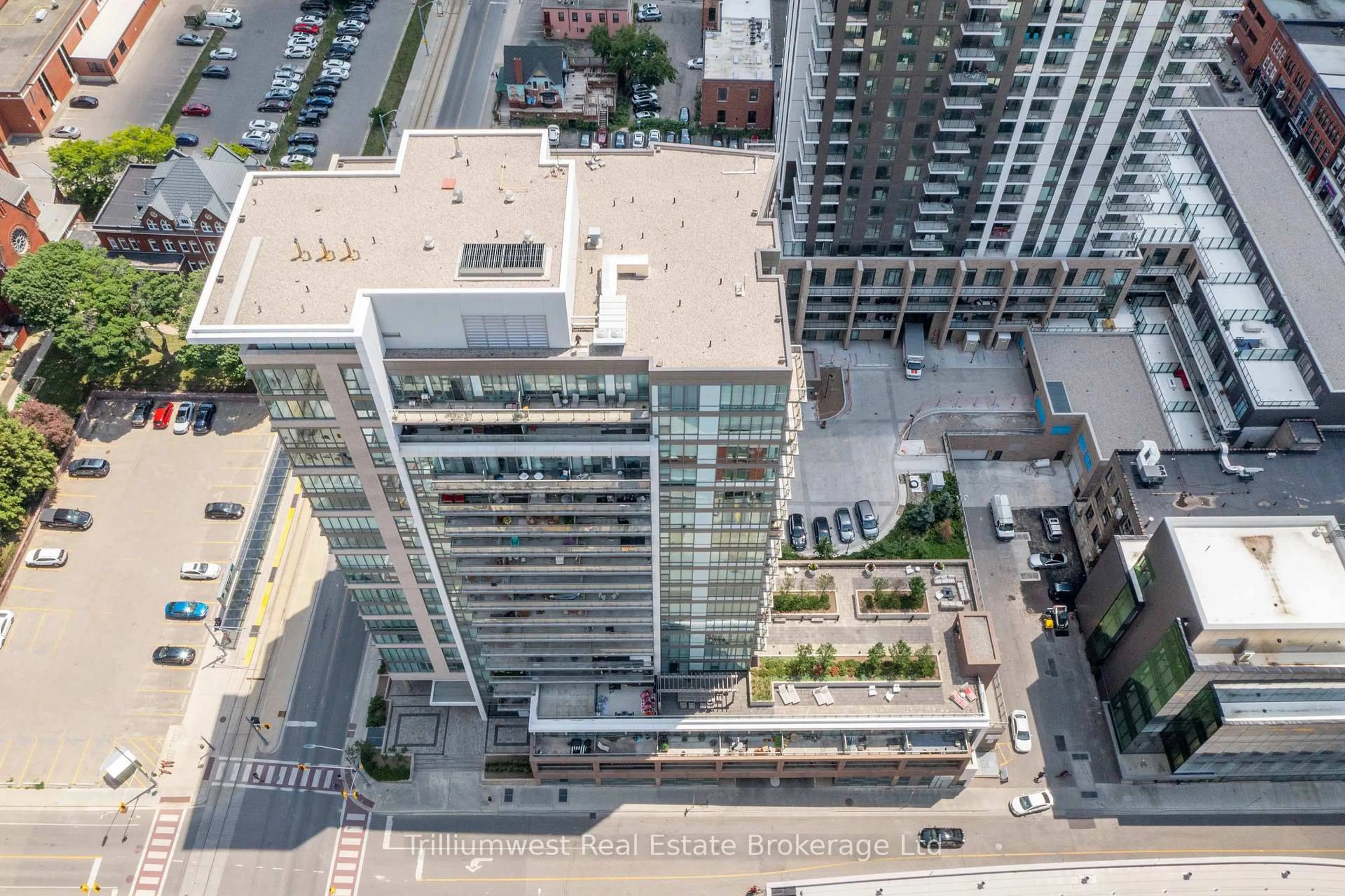 A pic from outside/outdoor area/front of a property/back of a property/a pic from drone, city buildings view from balcony for 85 Duke St #209, Kitchener Ontario N2H 0B7