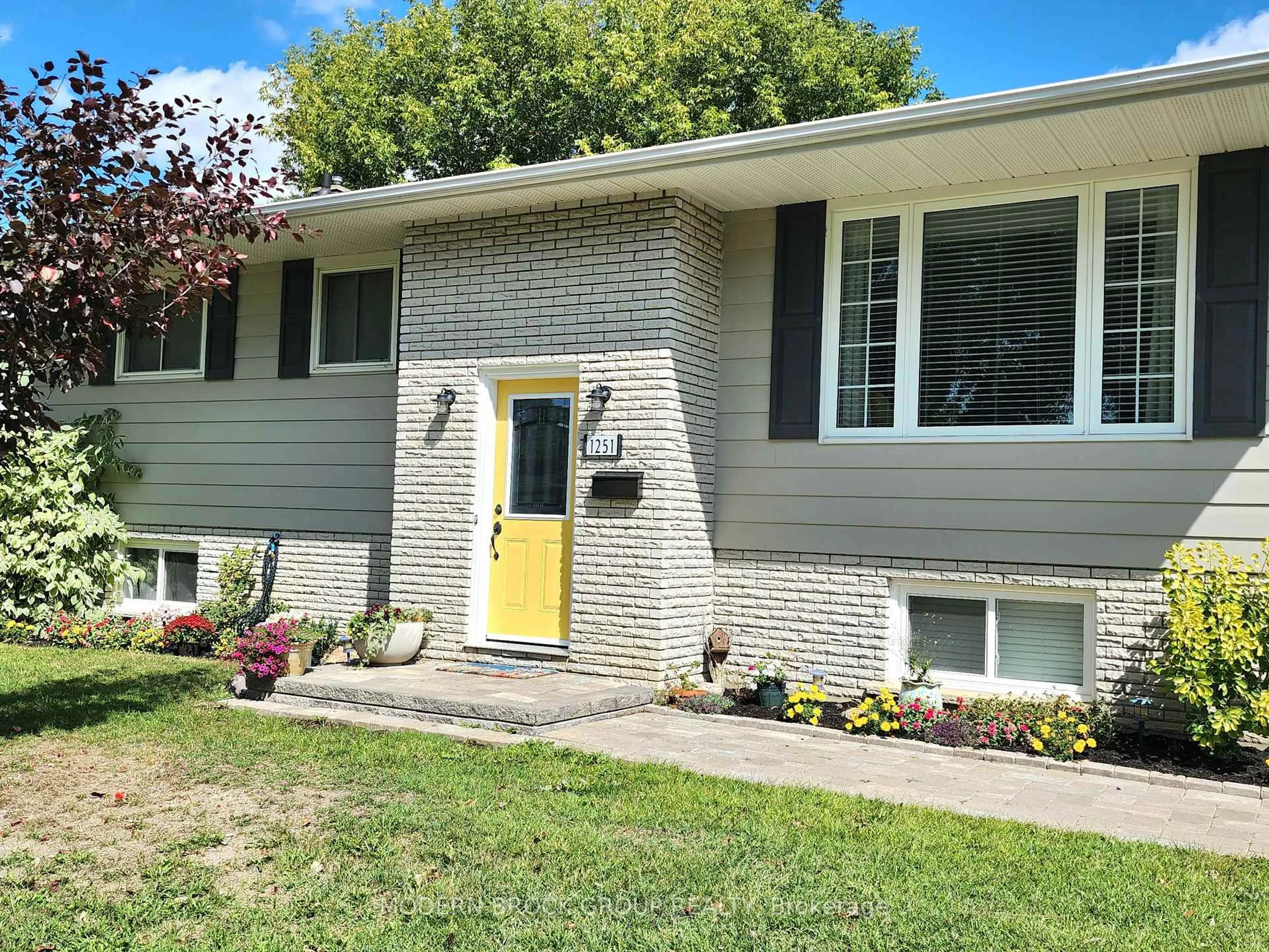 Home with vinyl exterior material, street for 1251 Peden Blvd, Brockville Ontario K6V 3K5