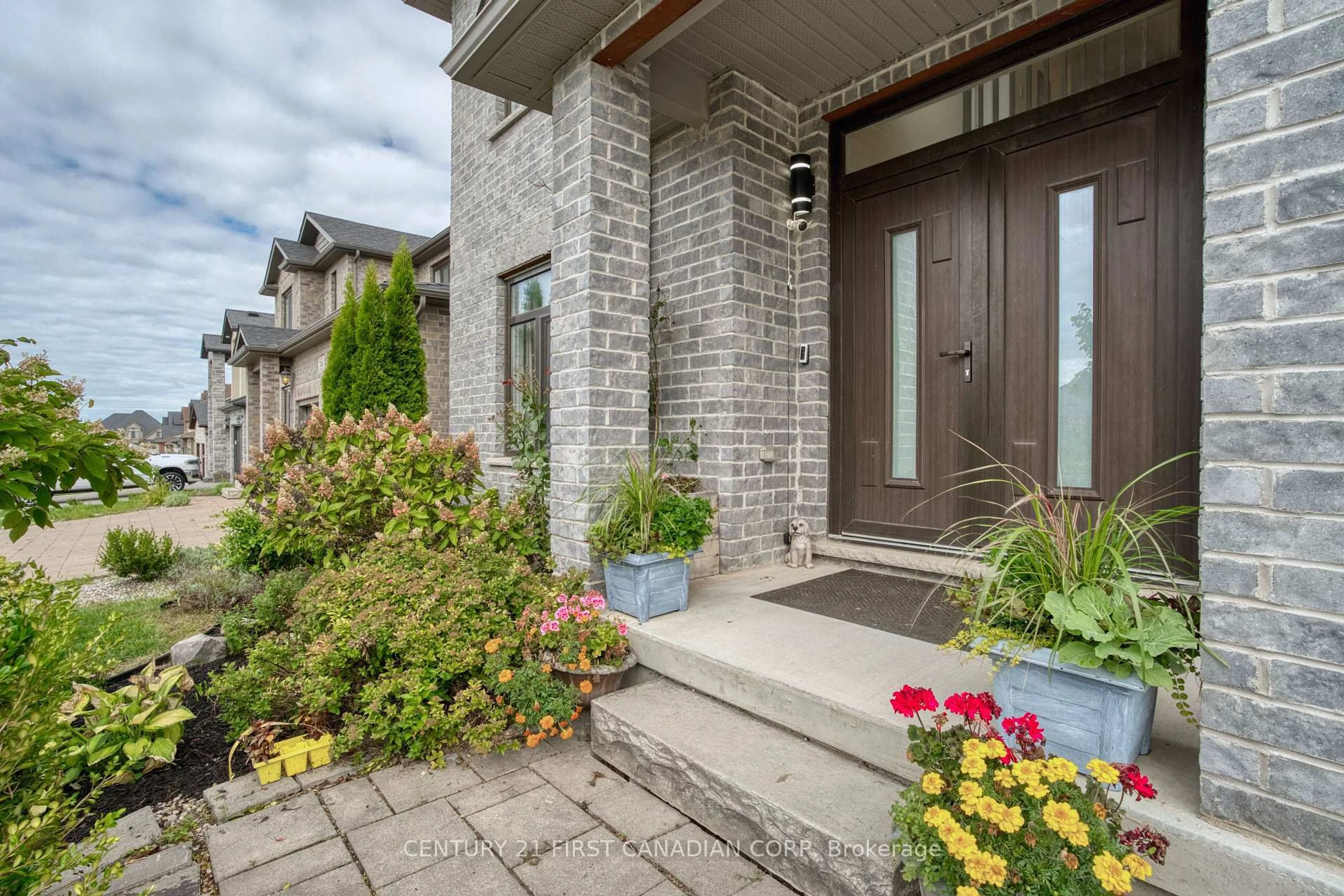 Home with brick exterior material, street for 754 Jackpine Way, London North Ontario N5X 0L9