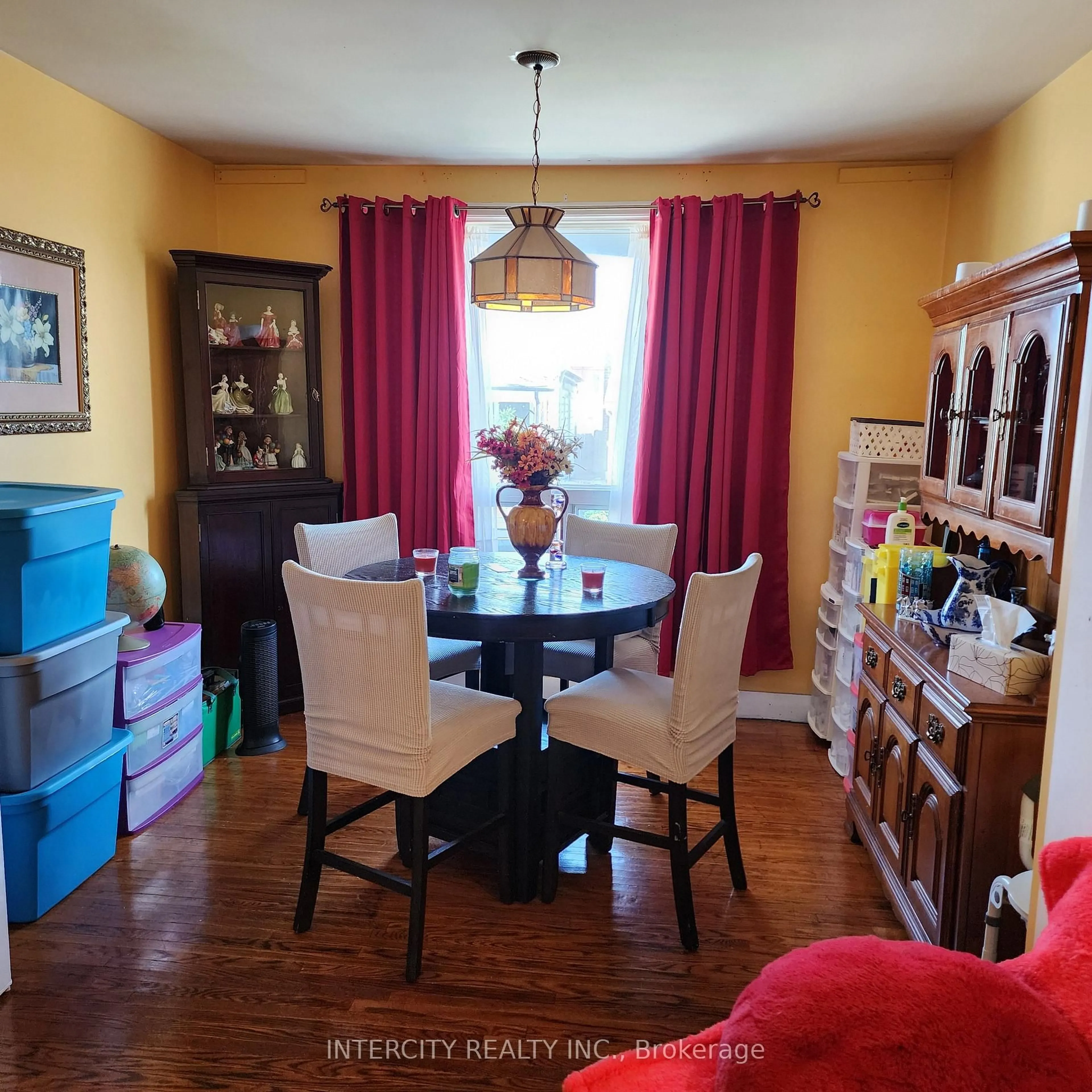 Dining room, wood/laminate floor for 70 Mayflower Ave, Hamilton Ontario L8L 2K4
