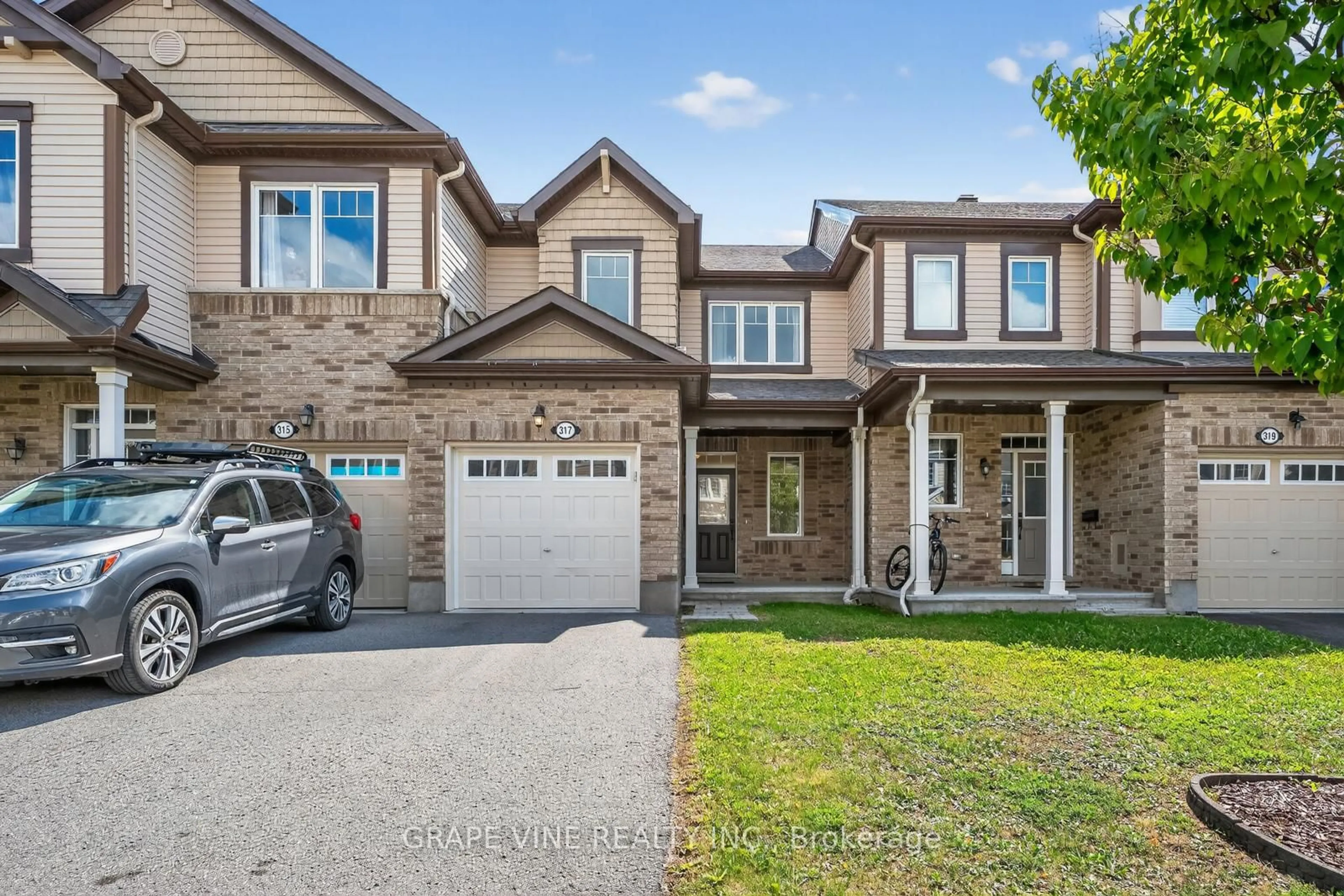 Home with brick exterior material, street for 317 Song Sparrow St, Ottawa Ontario K2J 0T5