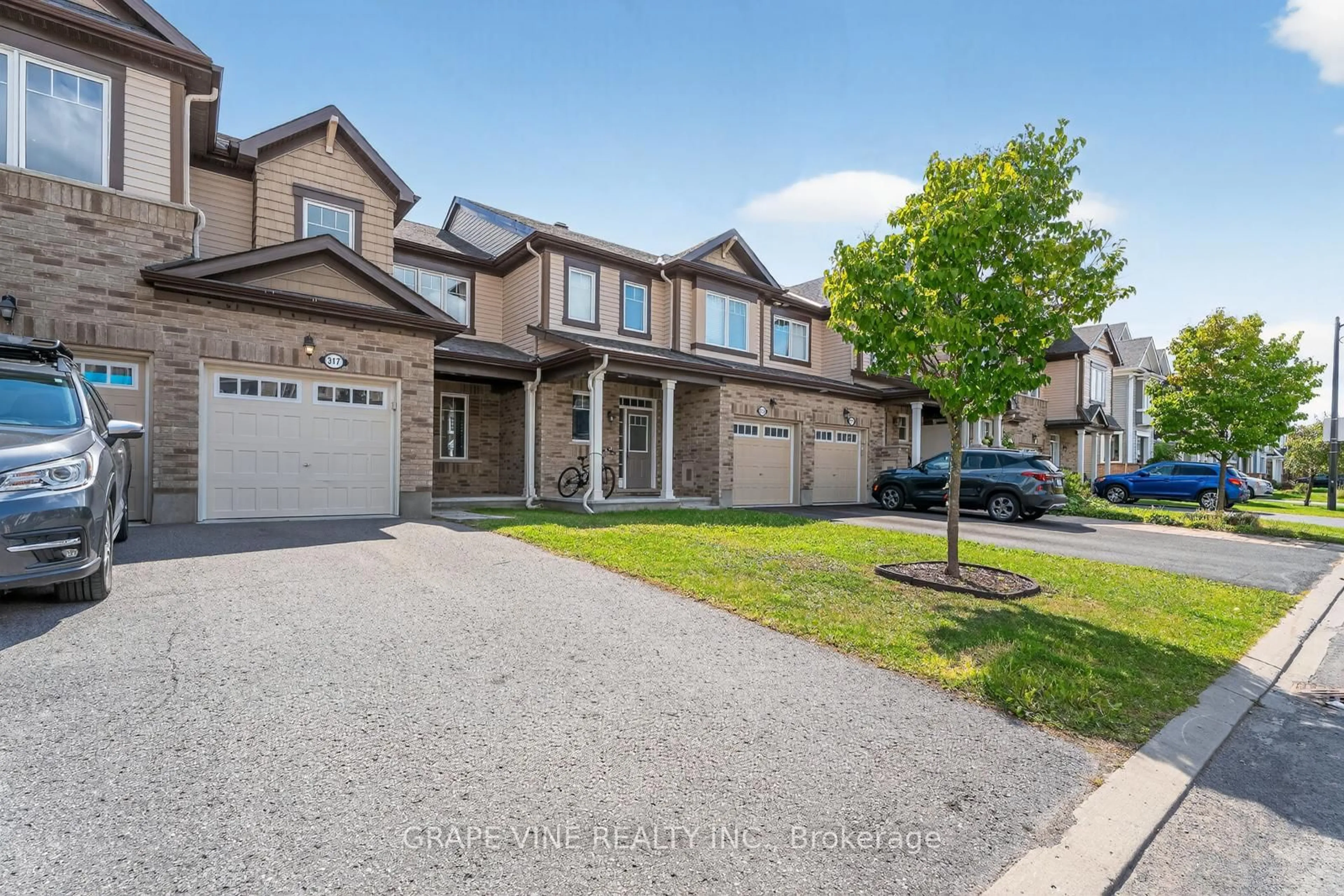 A pic from outside/outdoor area/front of a property/back of a property/a pic from drone, street for 317 Song Sparrow St, Ottawa Ontario K2J 0T5