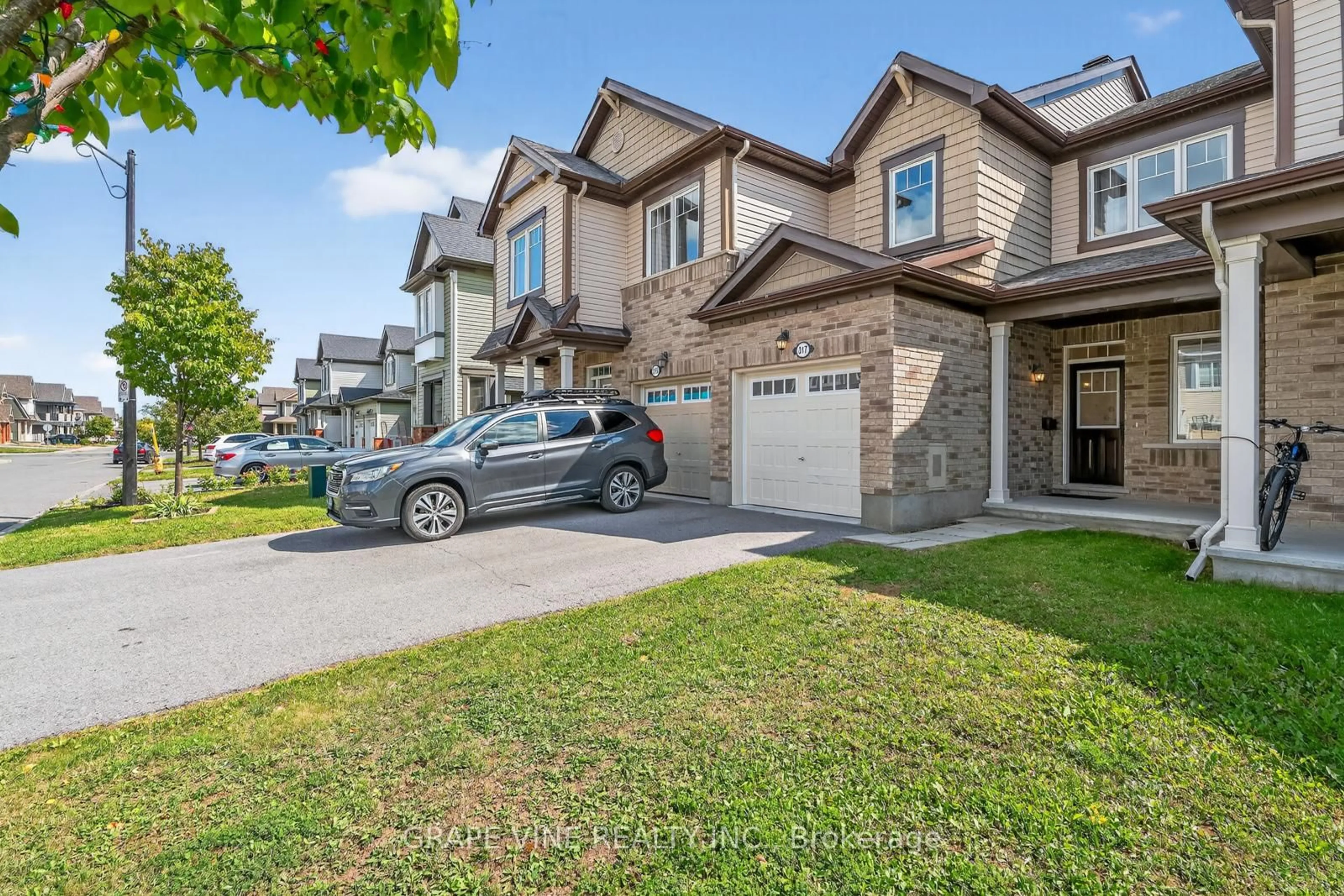 A pic from outside/outdoor area/front of a property/back of a property/a pic from drone, street for 317 Song Sparrow St, Ottawa Ontario K2J 0T5