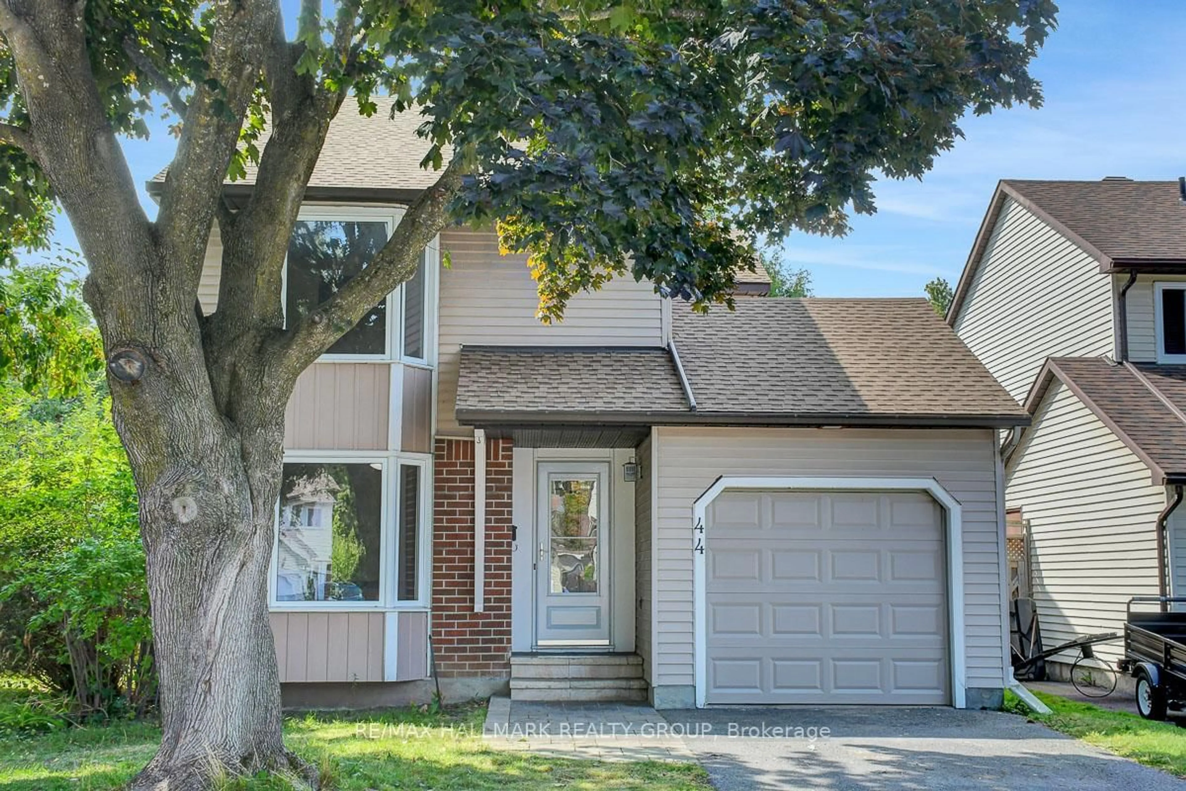 Home with vinyl exterior material, street for 44 Turret Crt, Ottawa Ontario K2L 2L1