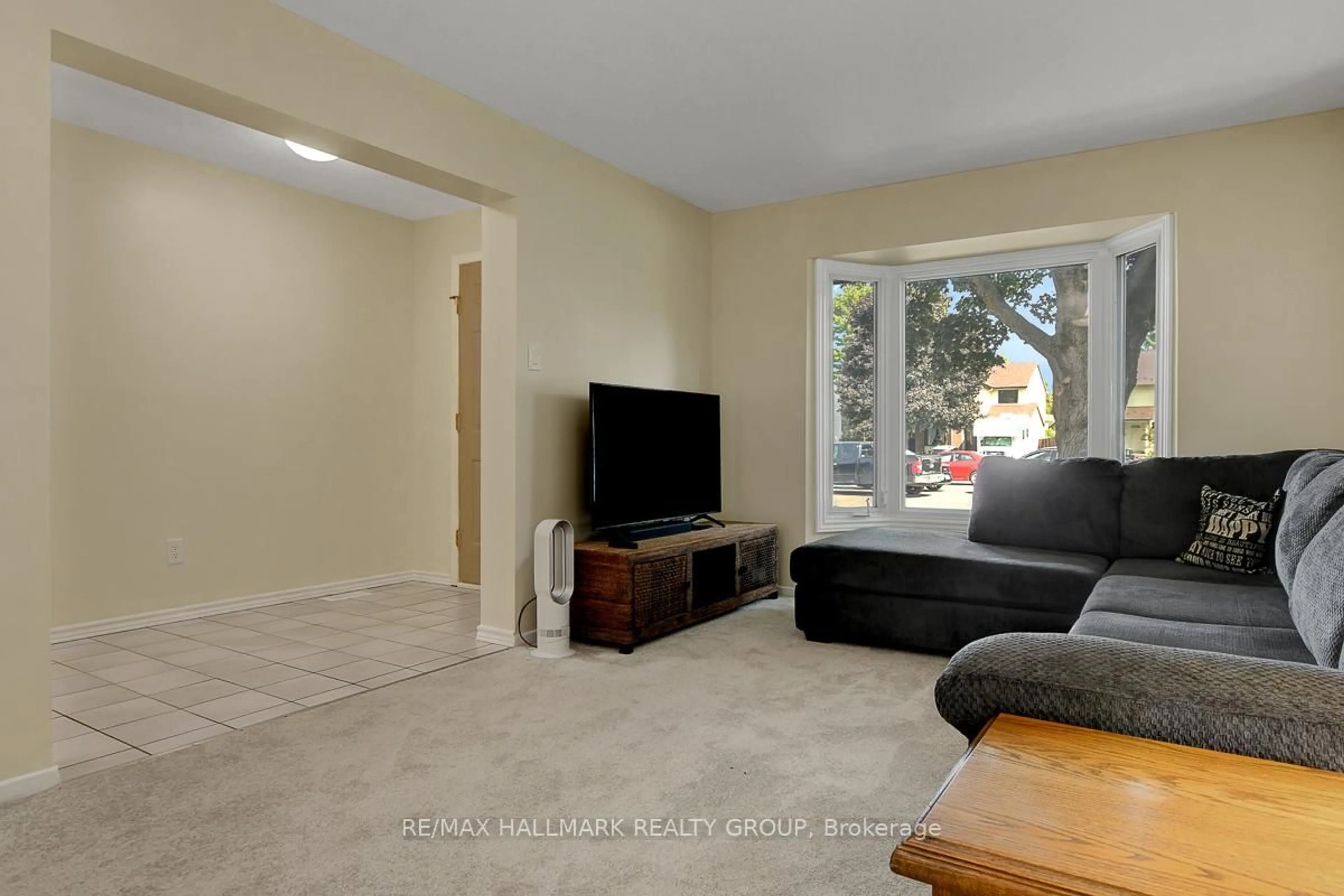 Living room with furniture, unknown for 44 Turret Crt, Ottawa Ontario K2L 2L1