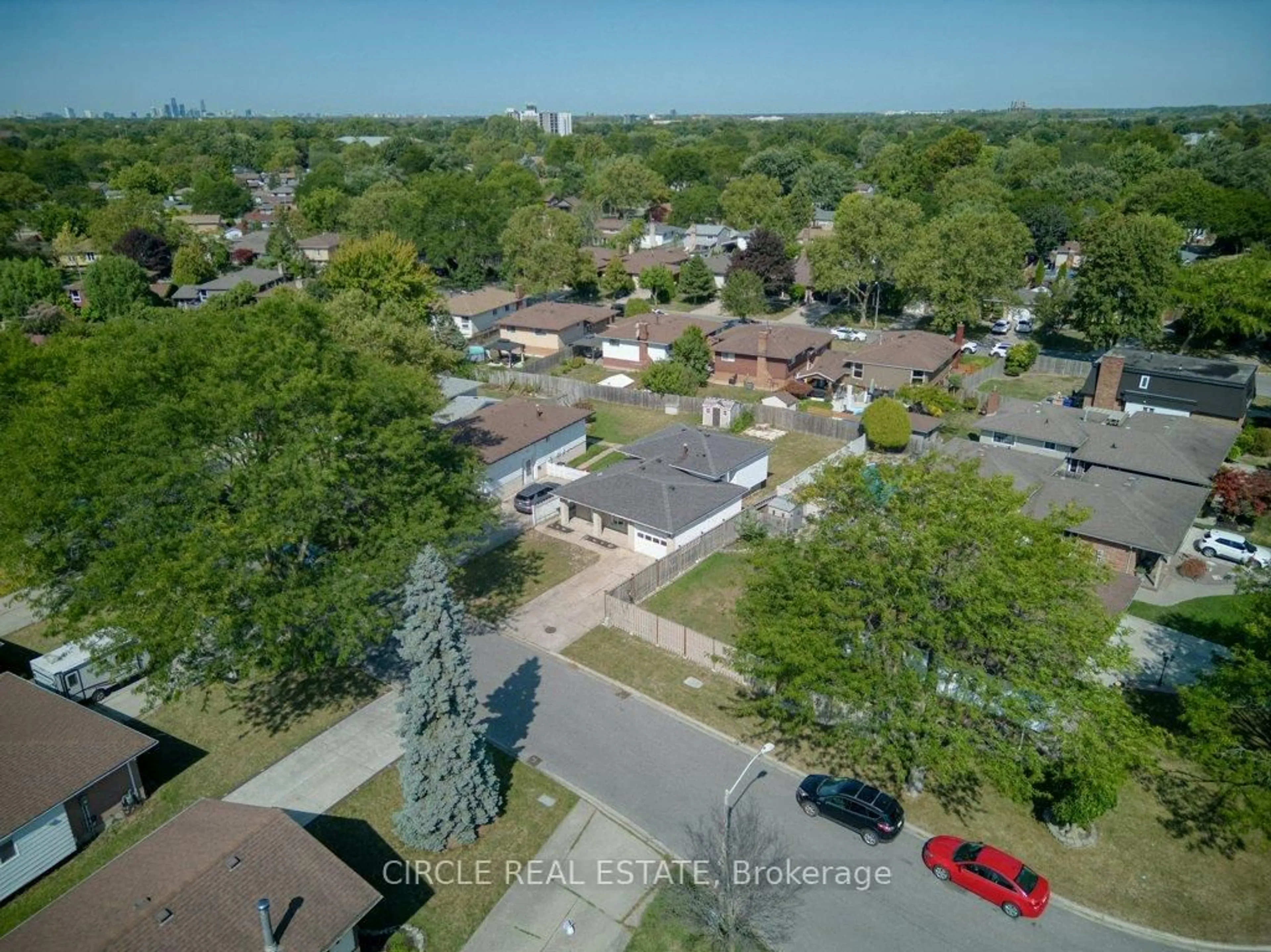 A pic from outside/outdoor area/front of a property/back of a property/a pic from drone, street for 10649 Halstead Cres, Windsor Ontario N8R 2C3