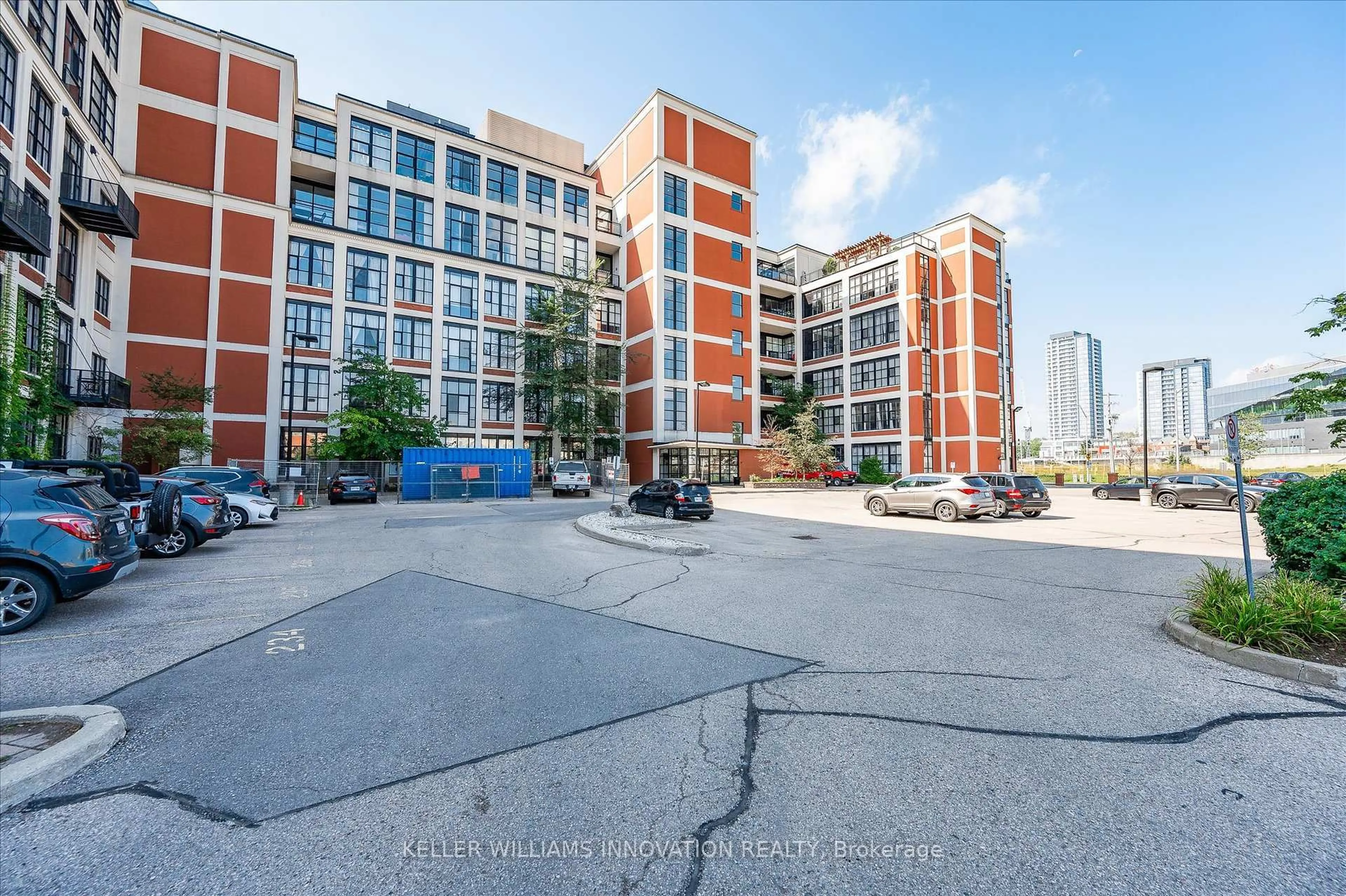A pic from outside/outdoor area/front of a property/back of a property/a pic from drone, unknown for 410 King St #116, Kitchener Ontario N2G 1C3