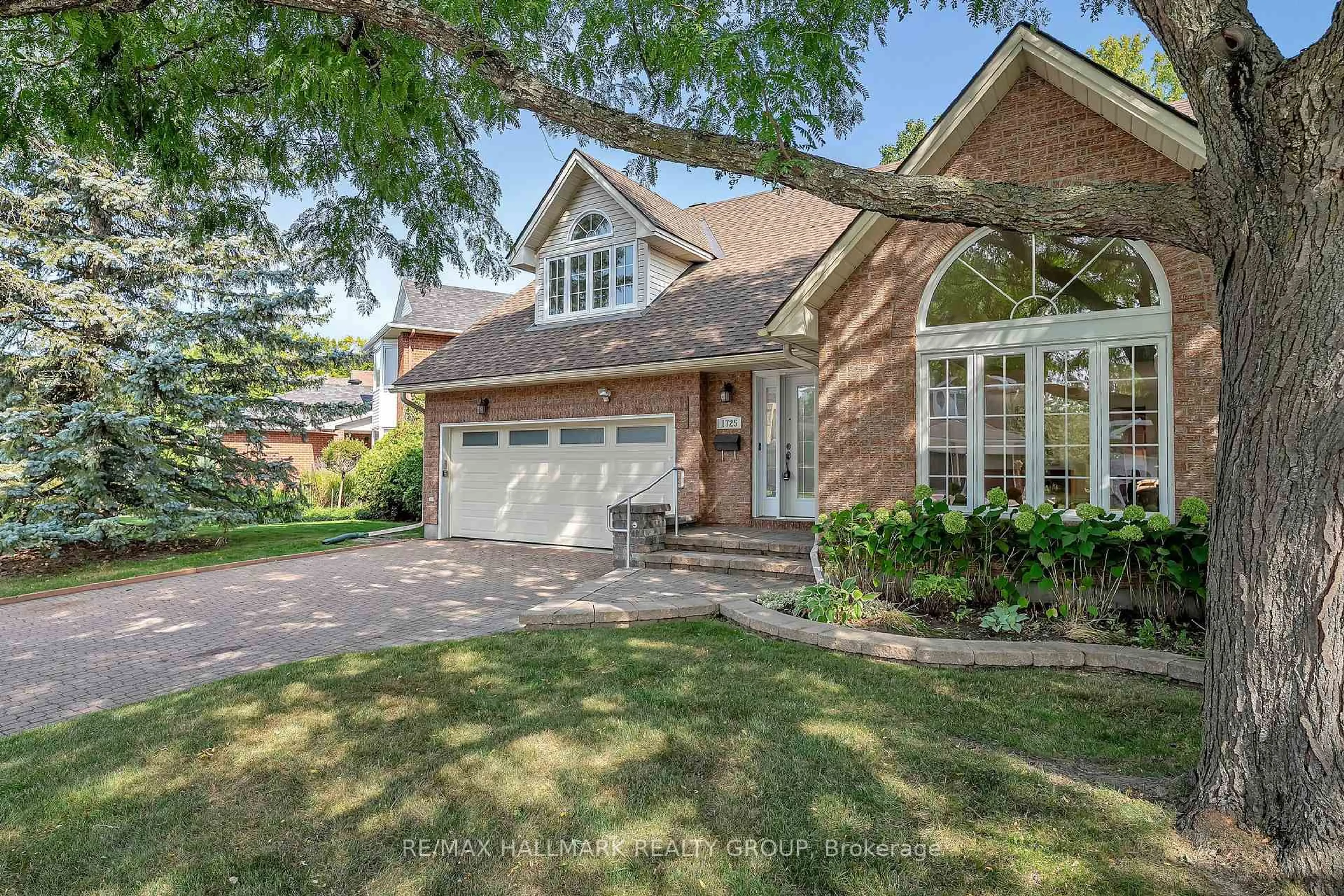 Home with brick exterior material, street for 1725 Autumn Ridge Dr, Ottawa Ontario K1C 6Z1