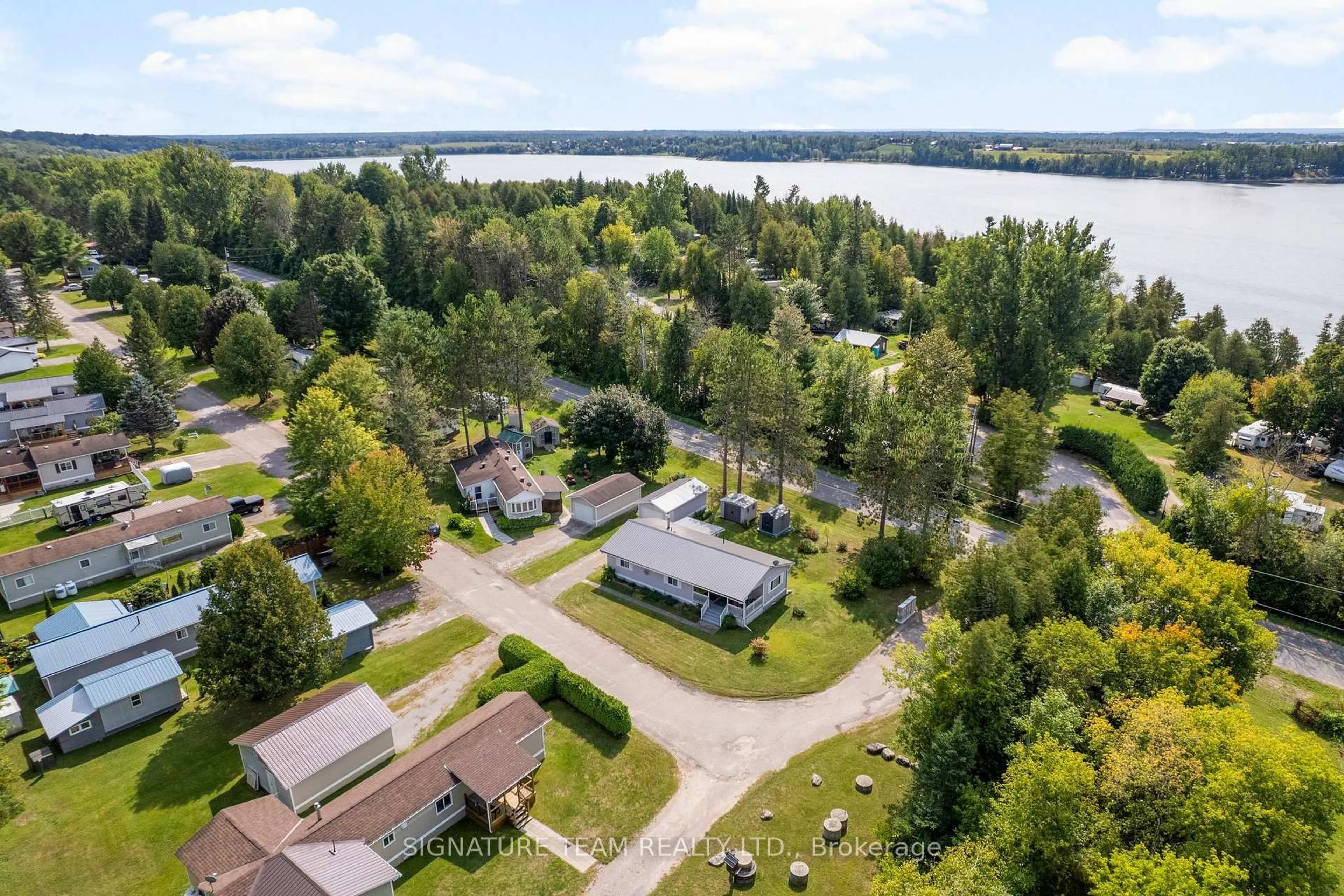A pic from outside/outdoor area/front of a property/back of a property/a pic from drone, water/lake/river/ocean view for 24 Robert Colin Lane, Cobden Ontario K0J 1K0