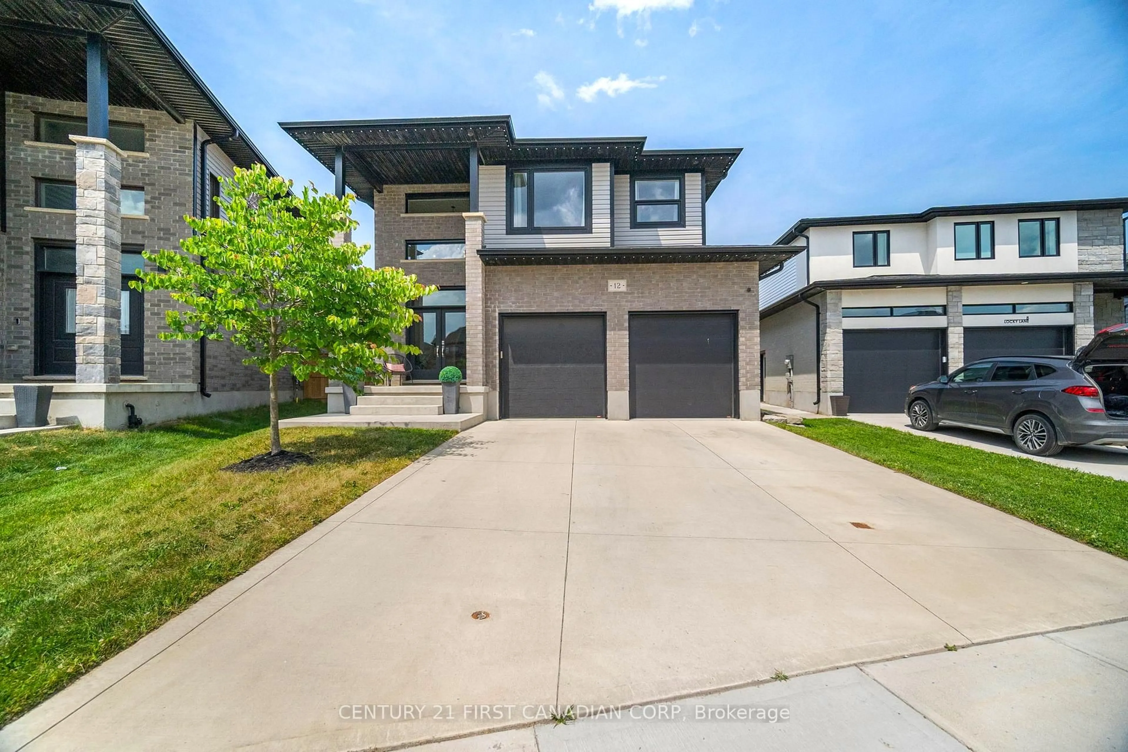 Home with brick exterior material, street for 12 Locky Lane, Middlesex Centre Ontario N0L 1R0