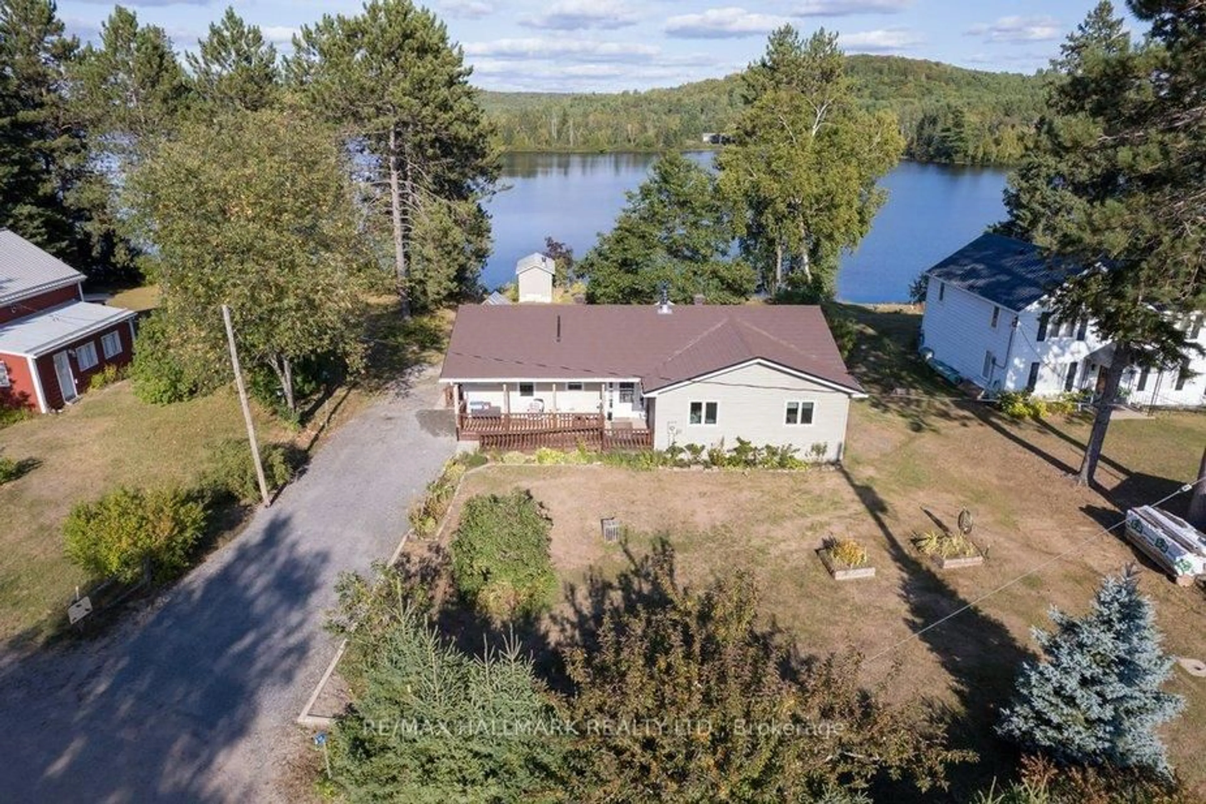 A pic from outside/outdoor area/front of a property/back of a property/a pic from drone, water/lake/river/ocean view for 35B Card Rd, Maynooth Ontario K0L 2K0