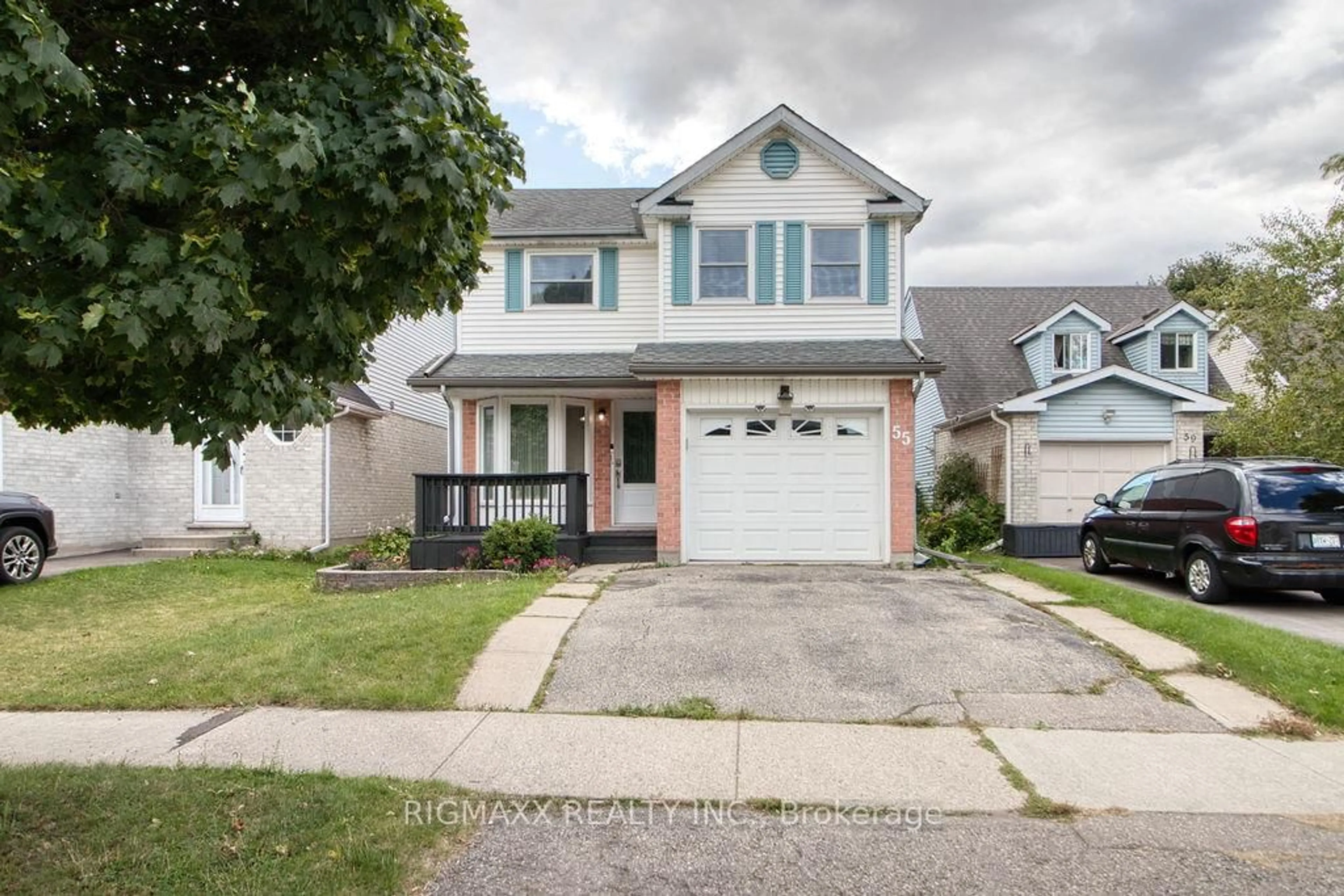 Home with vinyl exterior material, street for 55 Wycliffe Pl, Kitchener Ontario N2M 5J7