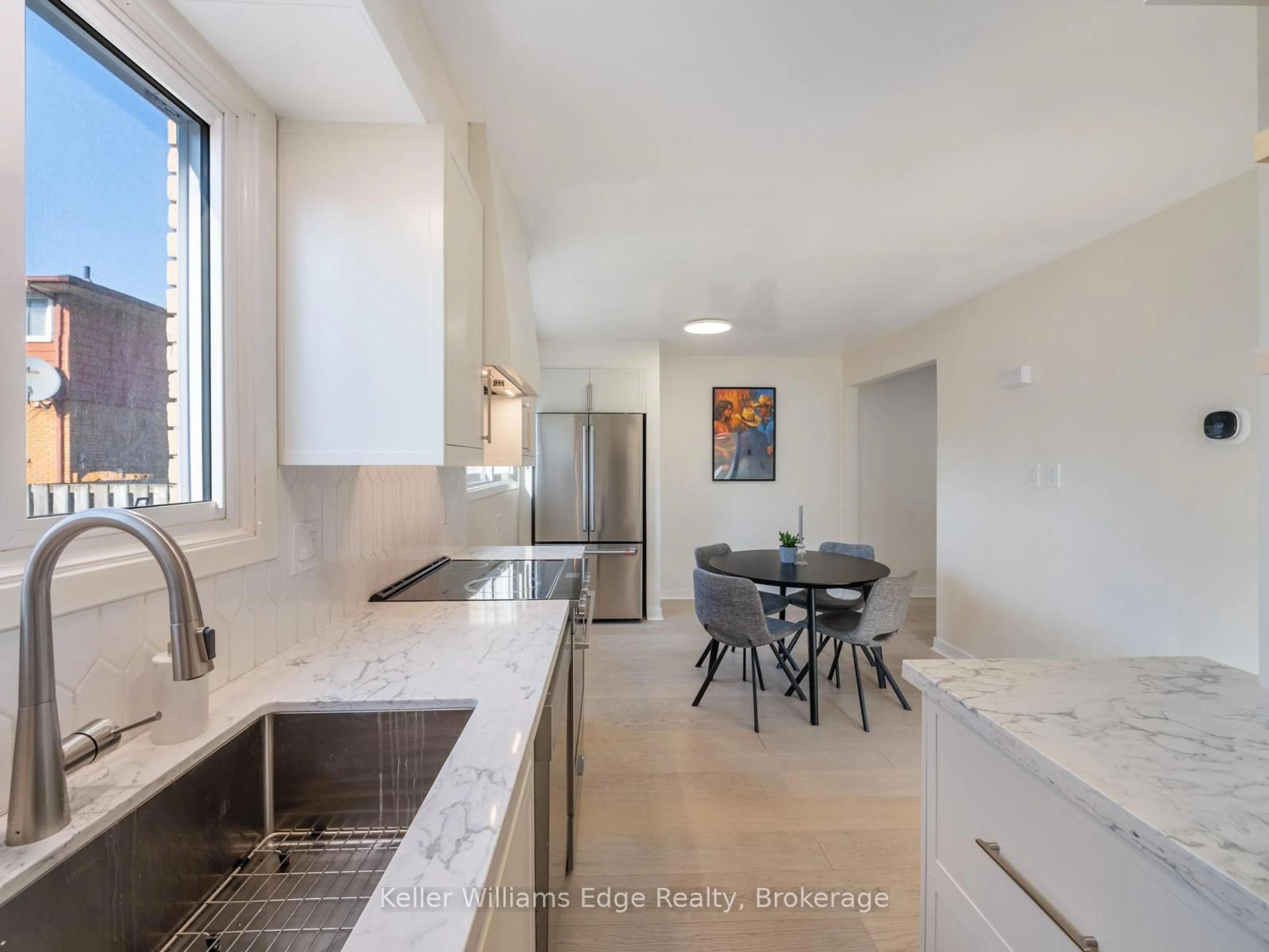 Open concept kitchen, ceramic/tile floor for 153 Dudhope Ave, Cambridge Ontario N1R 4T9