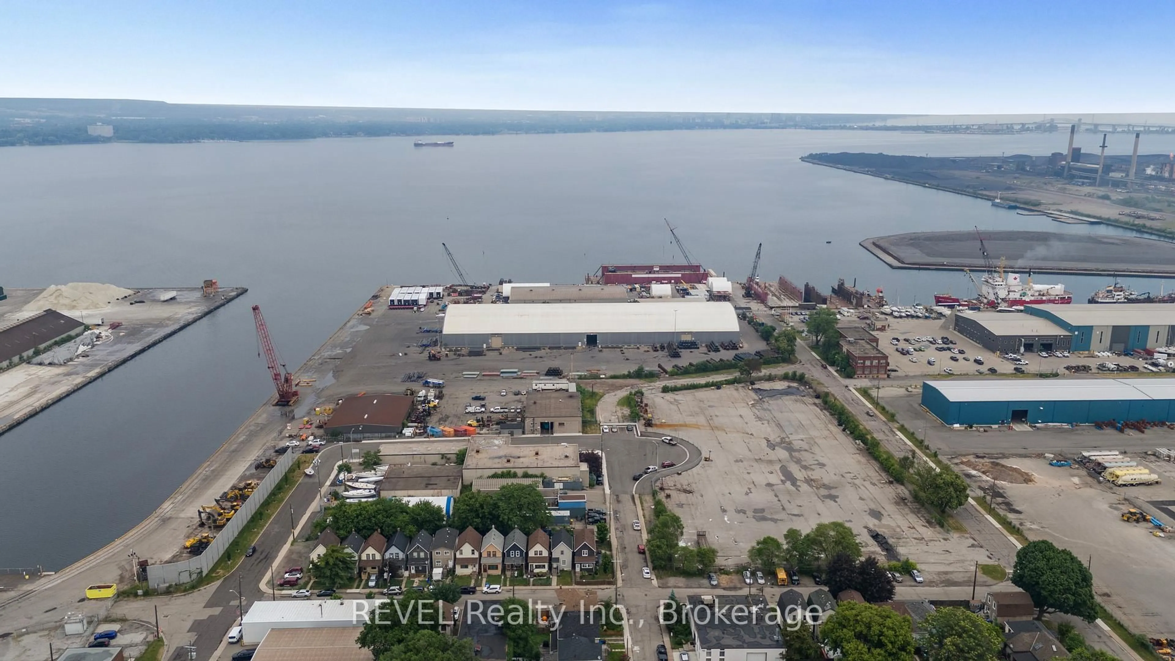A pic from outside/outdoor area/front of a property/back of a property/a pic from drone, water/lake/river/ocean view for 25 Land St, Hamilton Ontario L8L 4L1