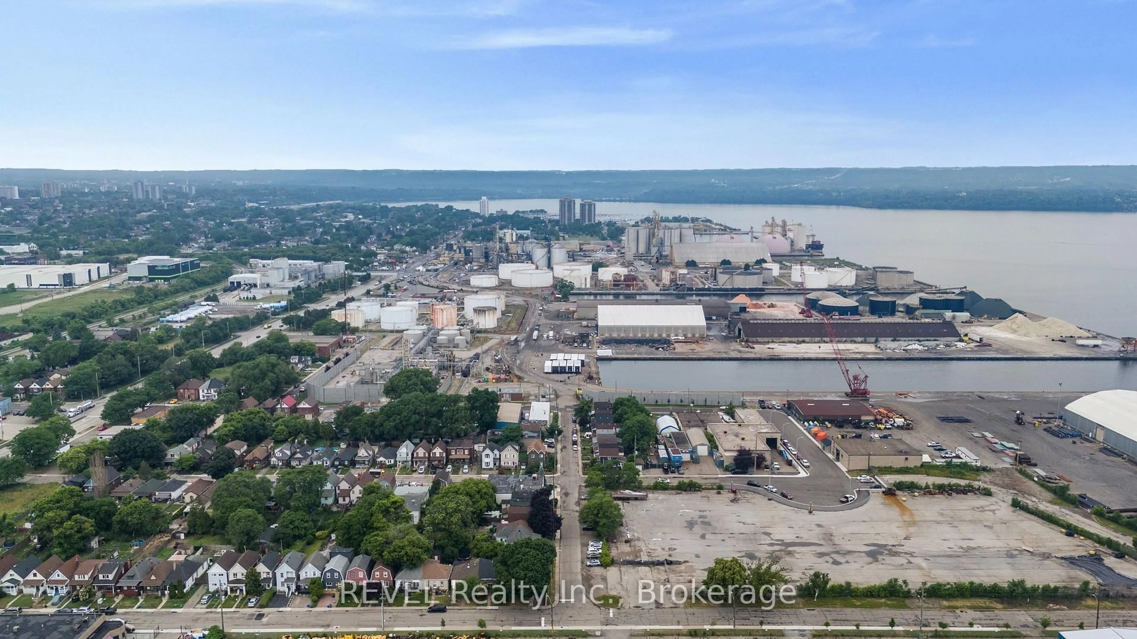 A pic from outside/outdoor area/front of a property/back of a property/a pic from drone, water/lake/river/ocean view for 25 Land St, Hamilton Ontario L8L 4L1