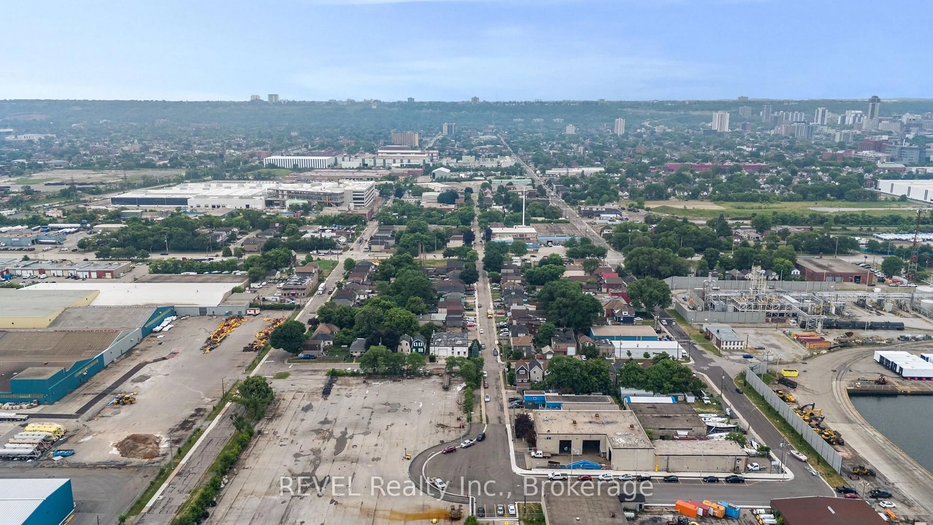 A pic from outside/outdoor area/front of a property/back of a property/a pic from drone, street for 25 Land St, Hamilton Ontario L8L 4L1