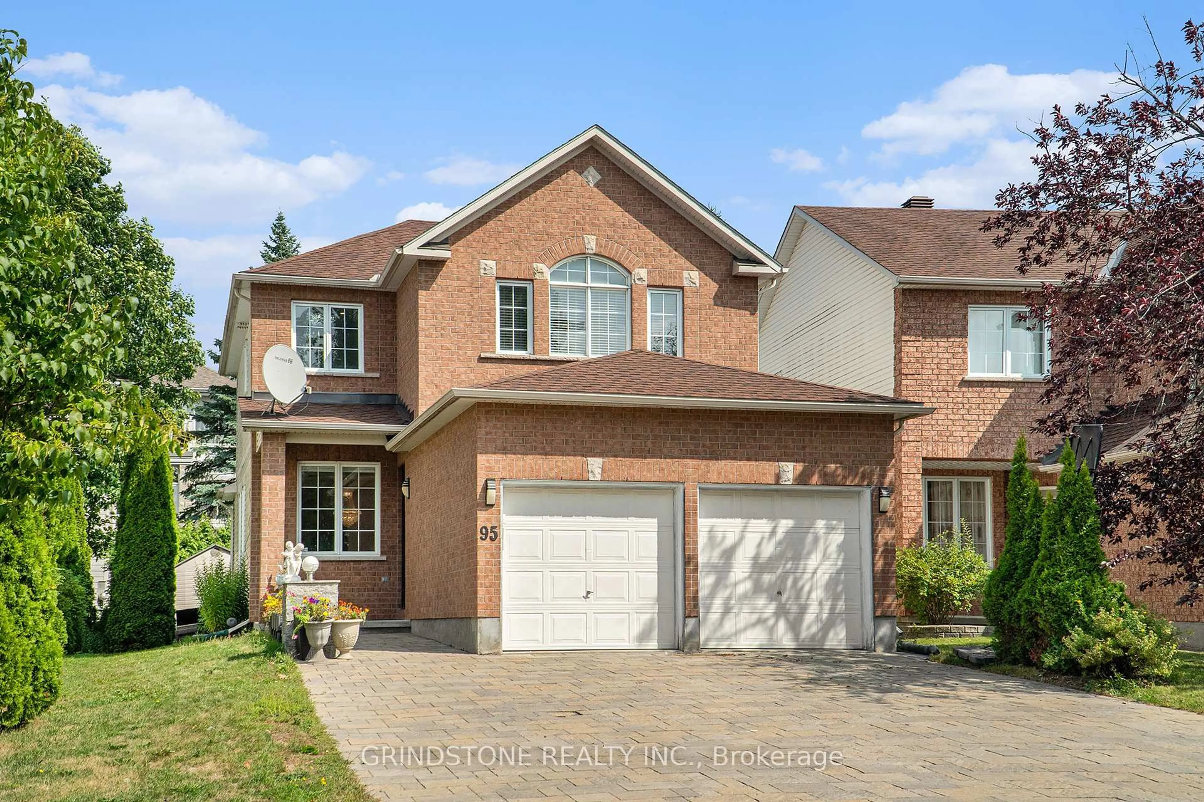 Home with brick exterior material, street for 95 Evanshen Cres, Kanata Ontario K2K 2X7
