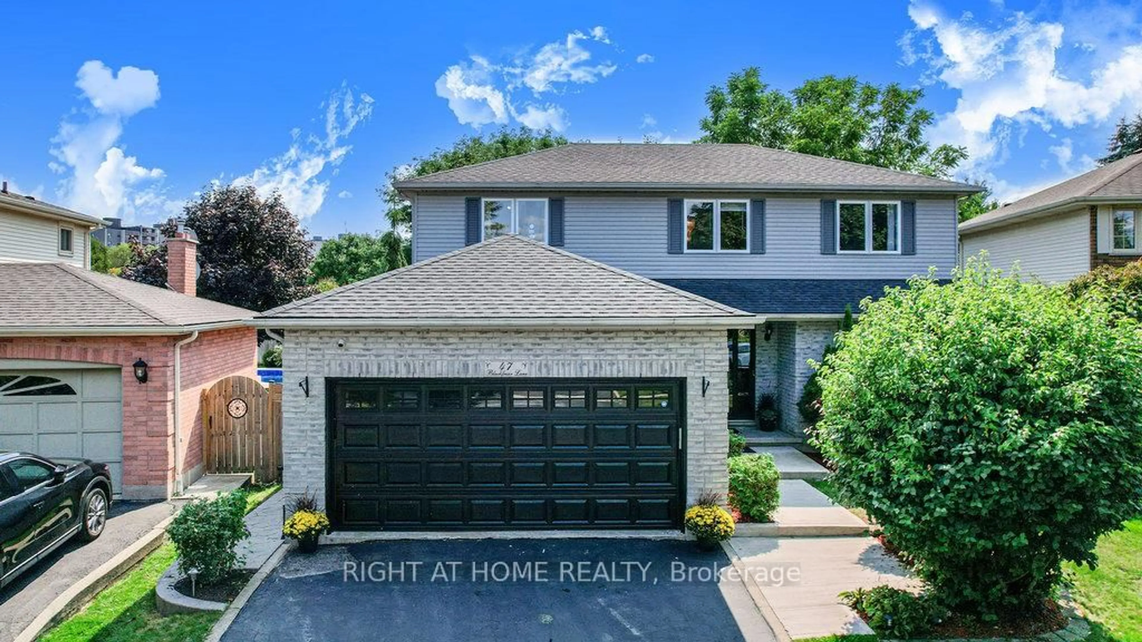 Home with vinyl exterior material, street for 47 Blackfriar Lane, Brantford Ontario N3R 7M2