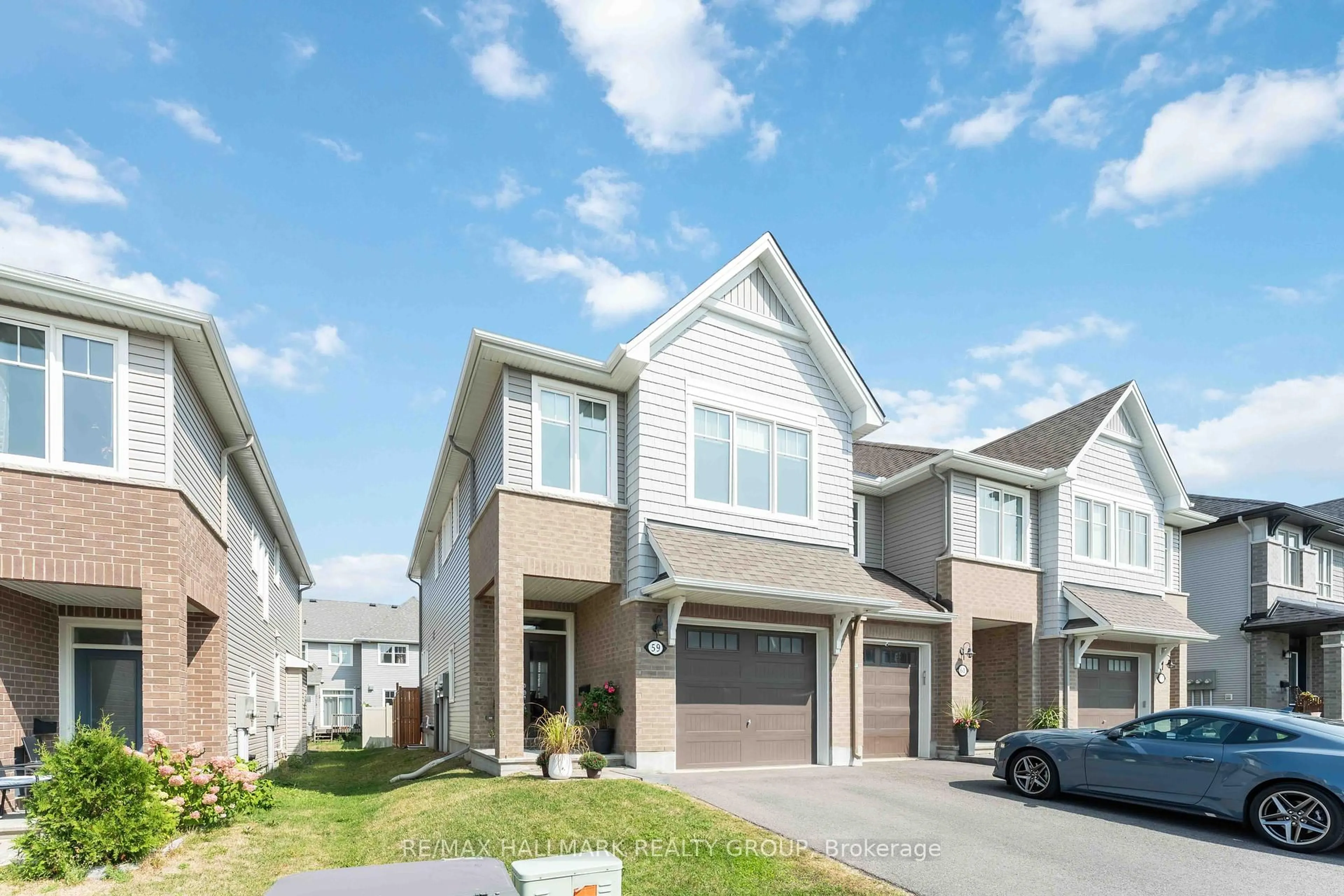 Home with vinyl exterior material, street for 59 Finsbury Ave, Ottawa Ontario K2S 2N8