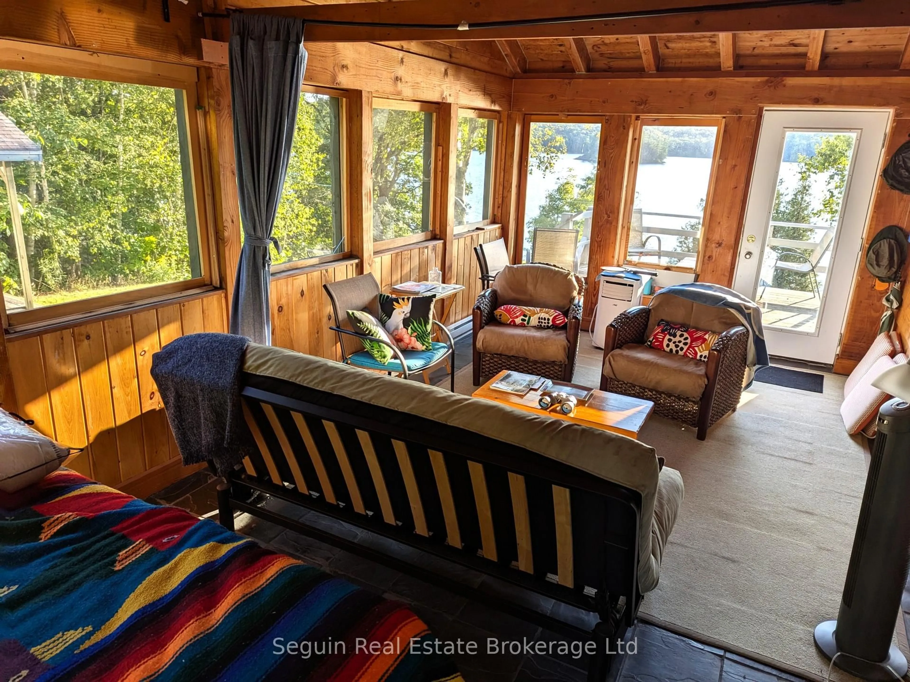Living room with furniture, wood/laminate floor for 15 Bella Lane, Seguin Ontario P2A 0B6