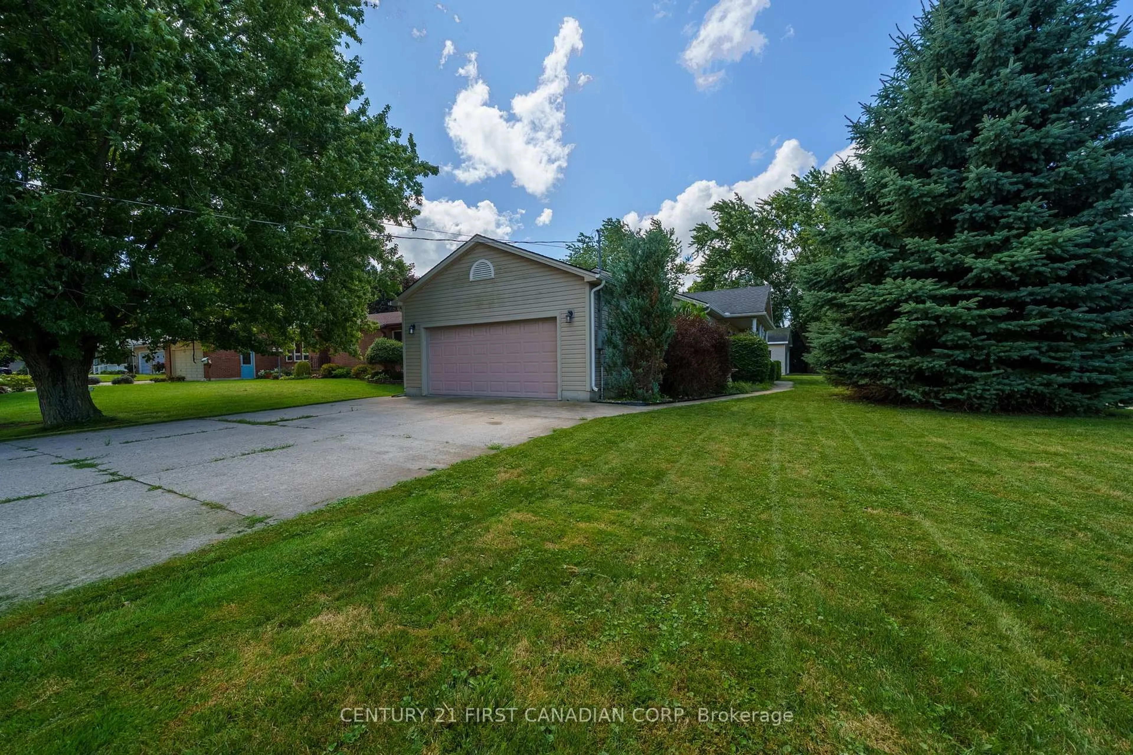A pic from outside/outdoor area/front of a property/back of a property/a pic from drone, street for 300 Station St St, North Middlesex Ontario N0M 2K0