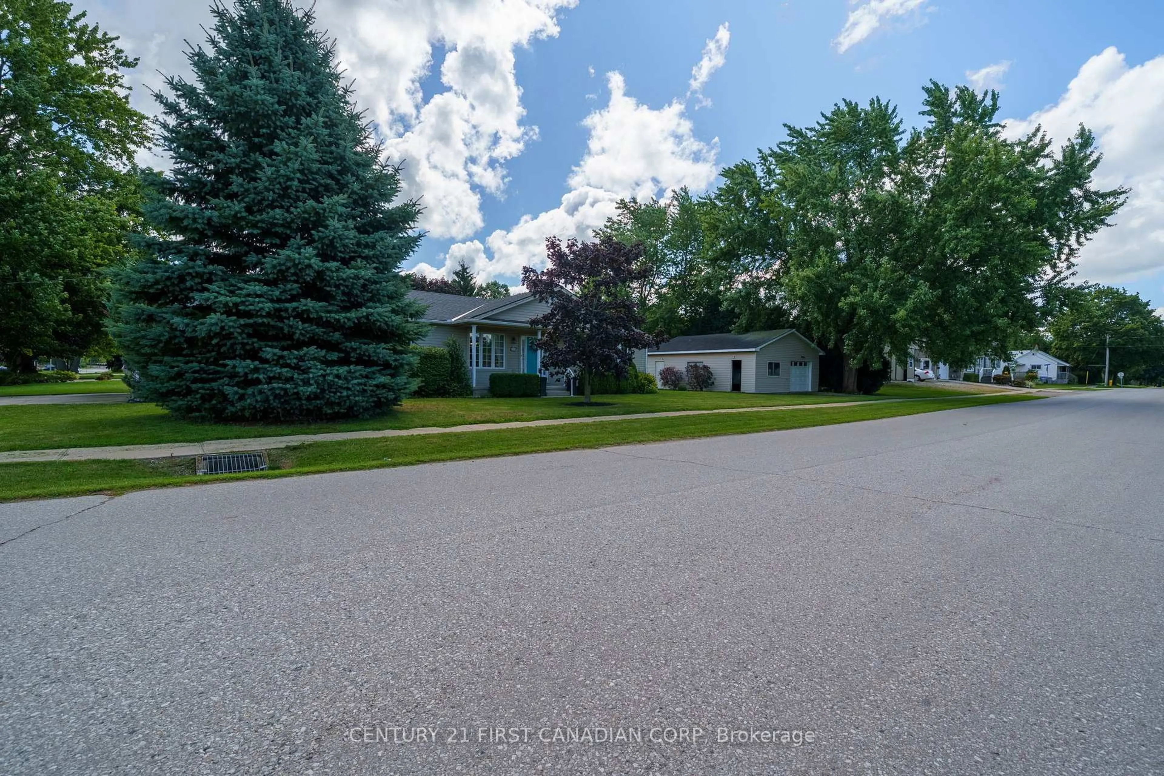 A pic from outside/outdoor area/front of a property/back of a property/a pic from drone, street for 300 Station St St, North Middlesex Ontario N0M 2K0