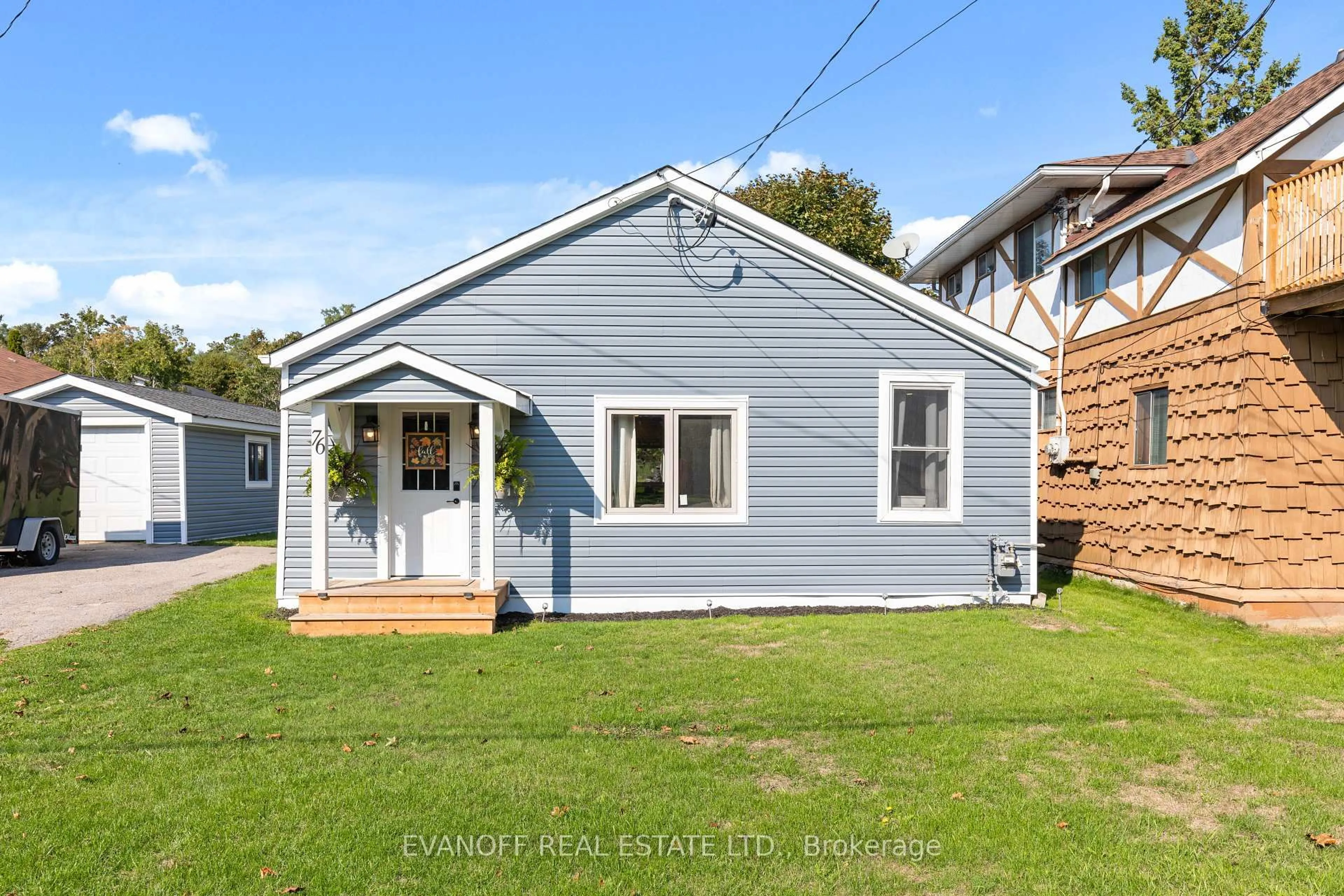 Home with vinyl exterior material, street for 76 Bond St, Kawartha Lakes Ontario K0M 1N0