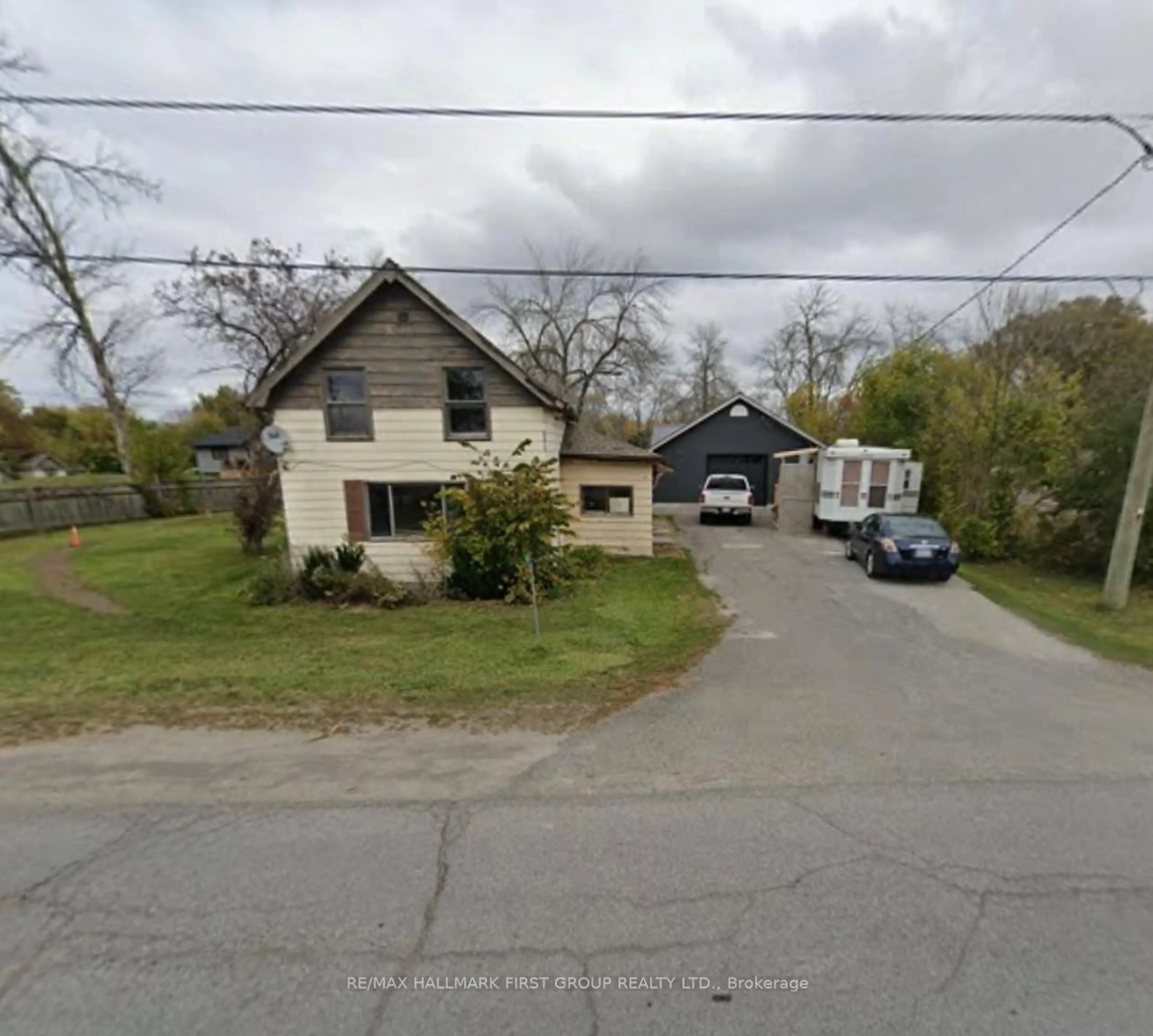 A pic from outside/outdoor area/front of a property/back of a property/a pic from drone, street for 794 County Road 28 Rd, Prince Edward County Ontario K8N 4Z7