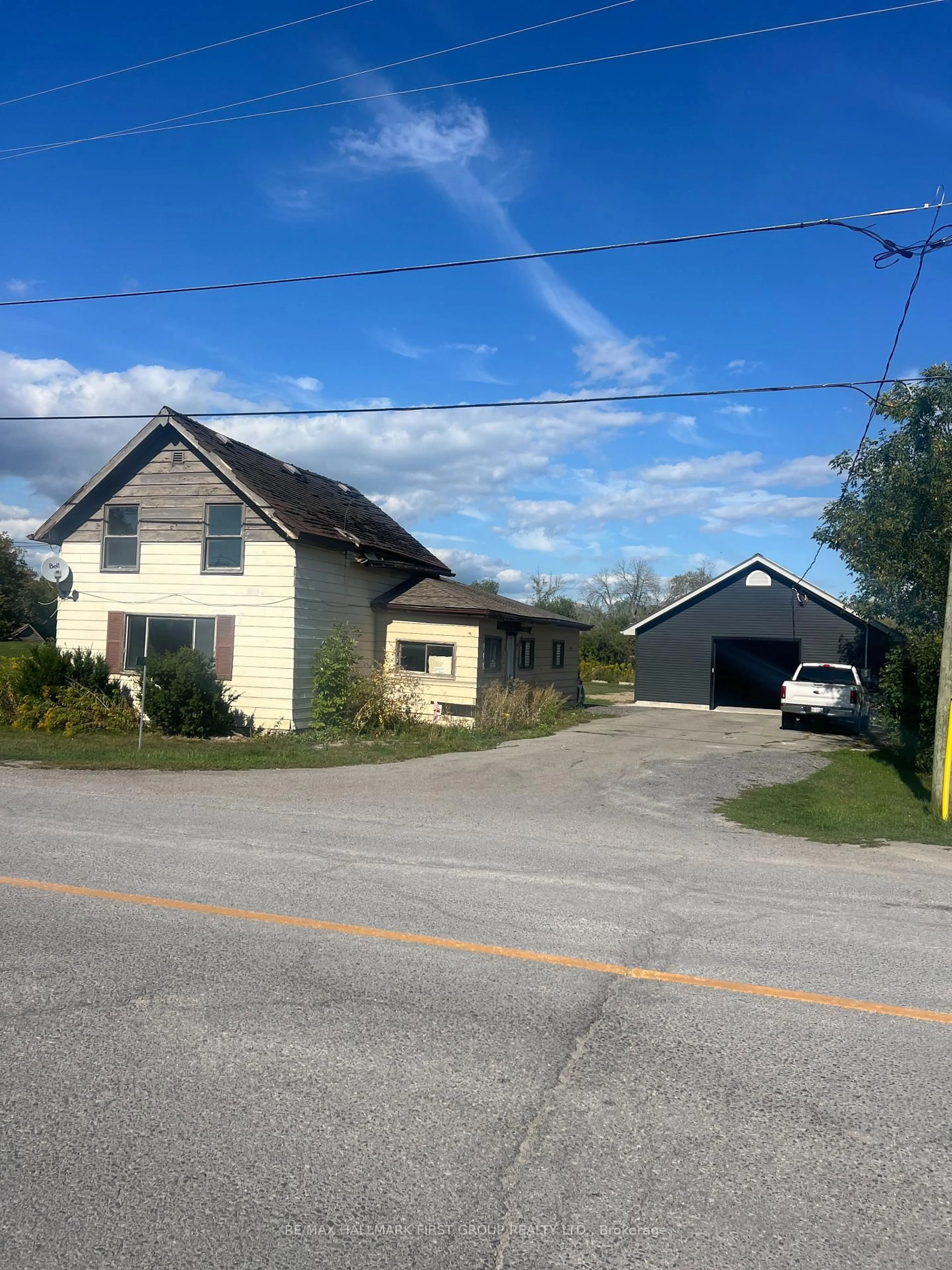 A pic from outside/outdoor area/front of a property/back of a property/a pic from drone, street for 794 County Road 28 Rd, Prince Edward County Ontario K8N 4Z7