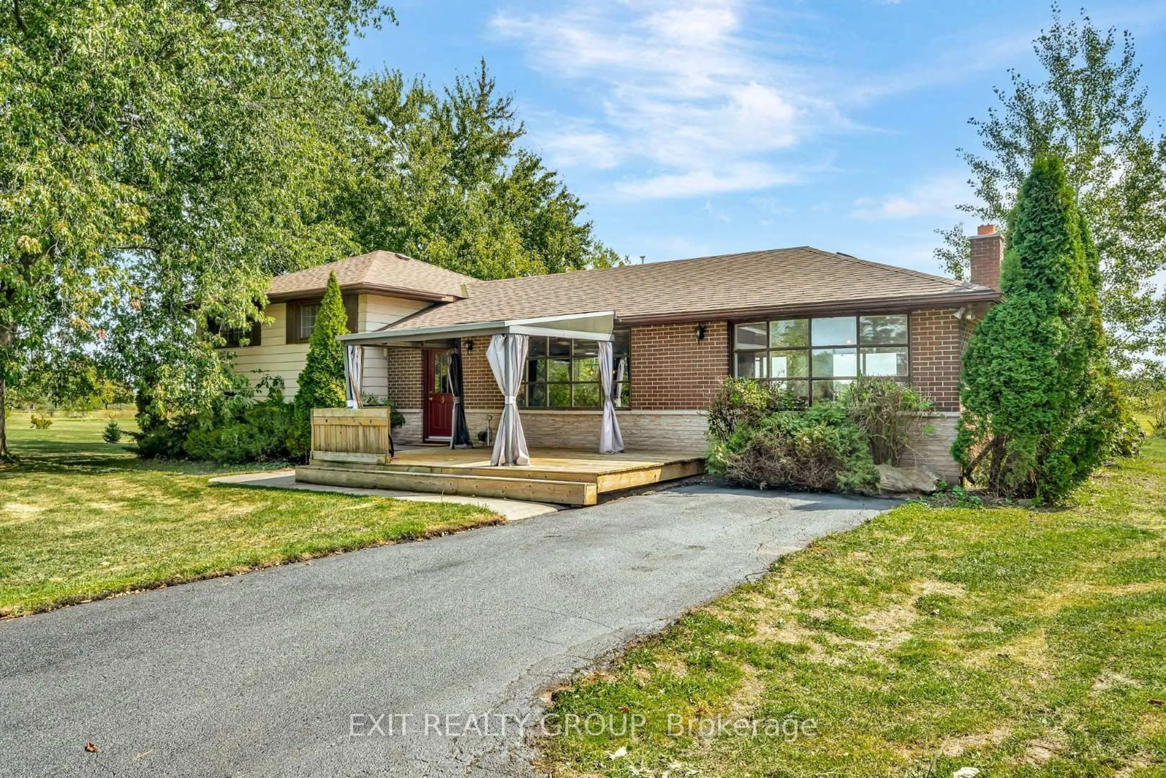Home with brick exterior material, street for 280 Massassauga Rd, Prince Edward County Ontario K8N 4Z7