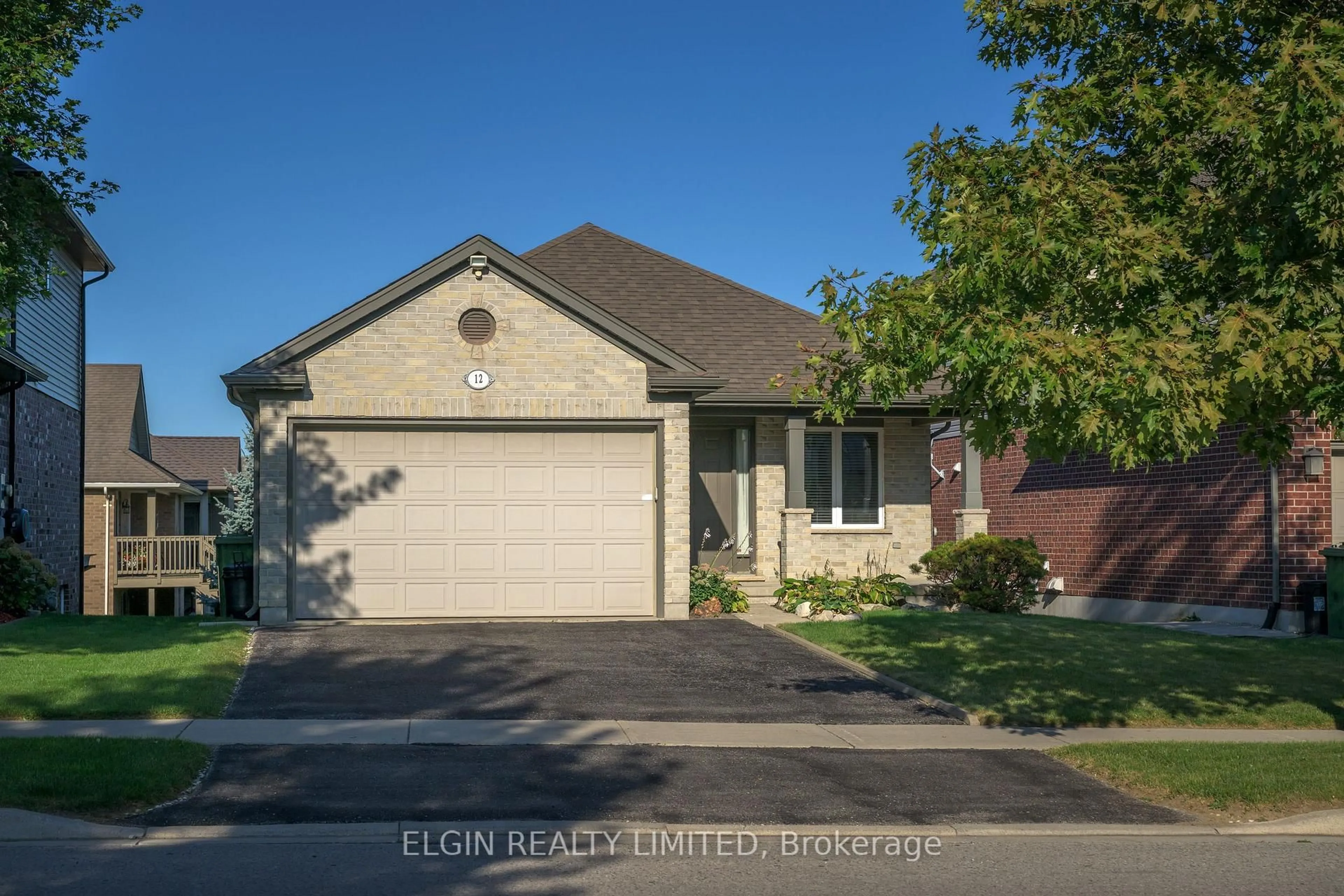 Home with brick exterior material, street for 12 PEACH TREE Blvd, St. Thomas Ontario N5R 0B3