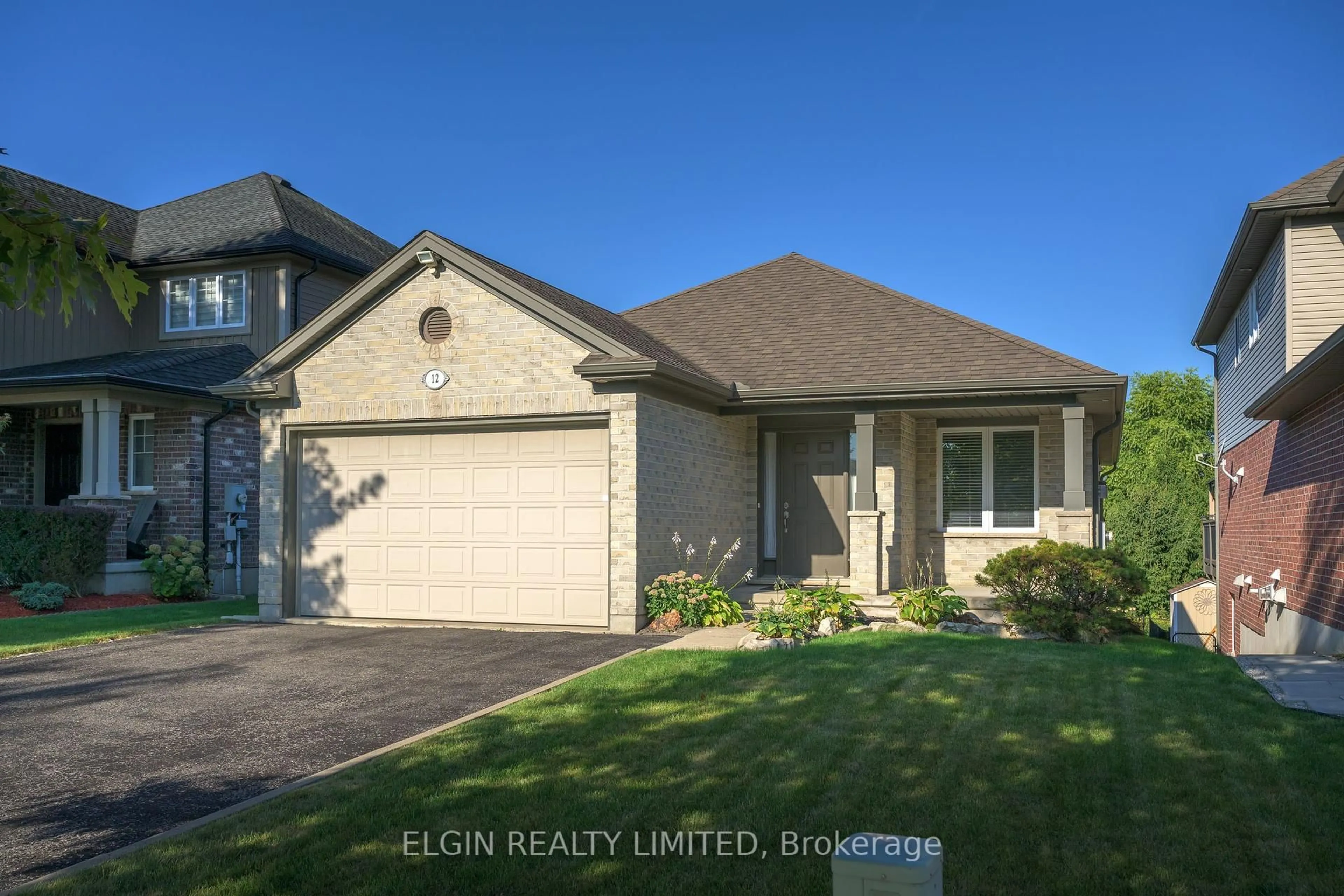 Home with brick exterior material, street for 12 PEACH TREE Blvd, St. Thomas Ontario N5R 0B3