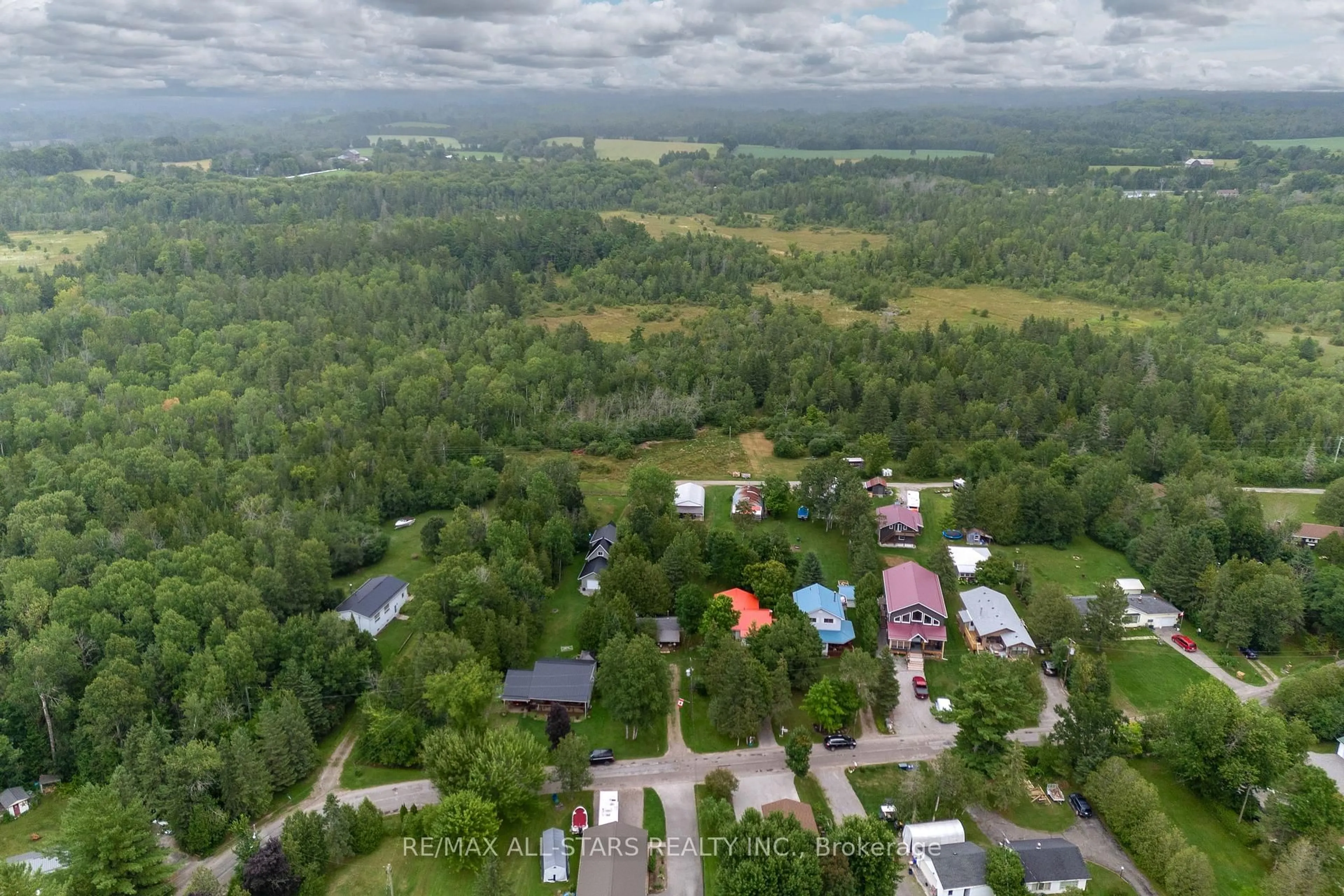 A pic from outside/outdoor area/front of a property/back of a property/a pic from drone, forest/trees view for 93 Sturgeon Glen Rd, Kawartha Lakes Ontario K0M 1N0