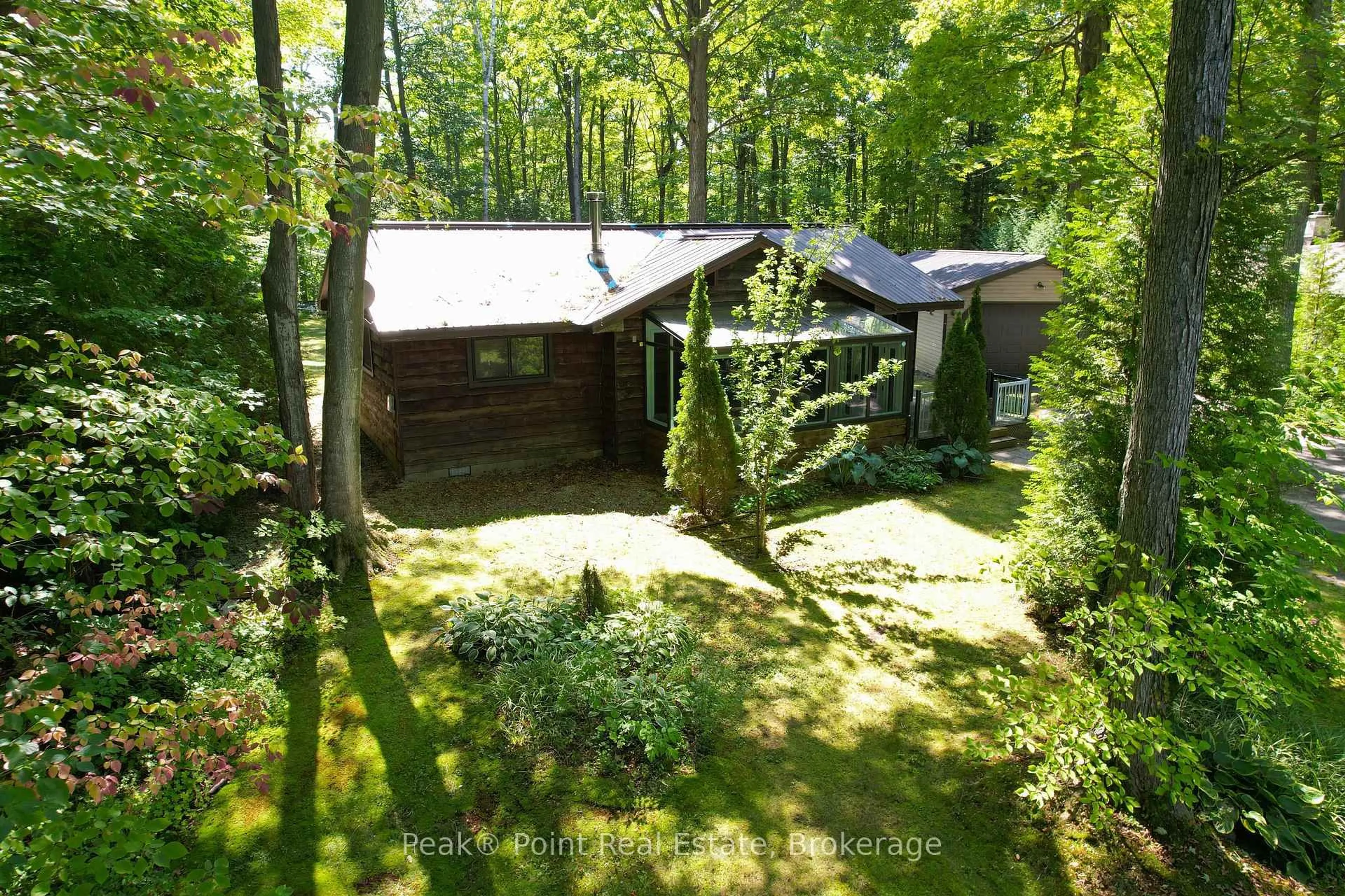 A pic from outside/outdoor area/front of a property/back of a property/a pic from drone, forest/trees view for 46 Mapleport Cres, South Bruce Peninsula Ontario N0H 2G0